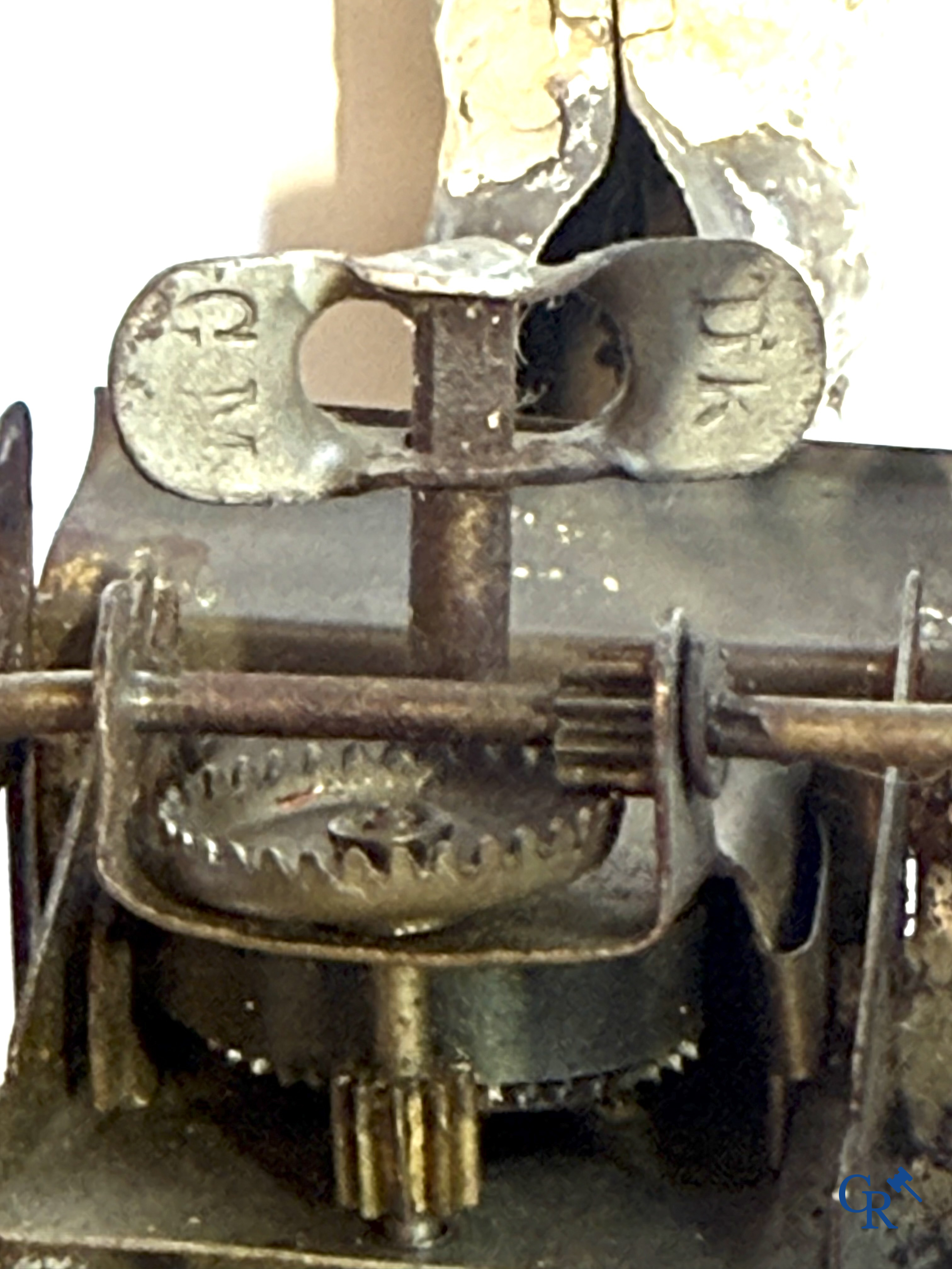 Günthermann. A mechanically painted tin toy, pierrot with goat. Germany circa 1910.