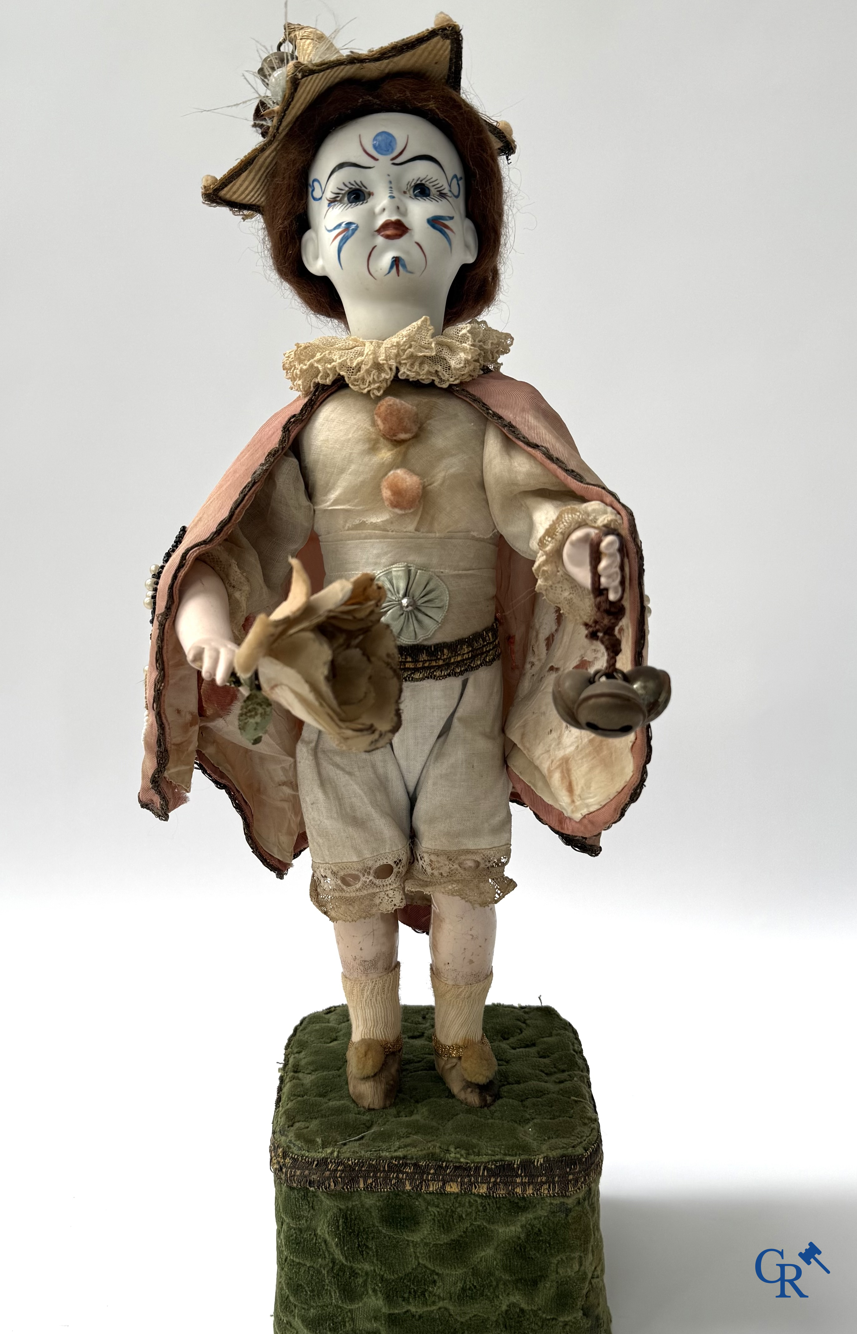 Lambert, Automaat. Clown met bewegingsmechanisme, muziek en porselein hoofd. Circa 1900.