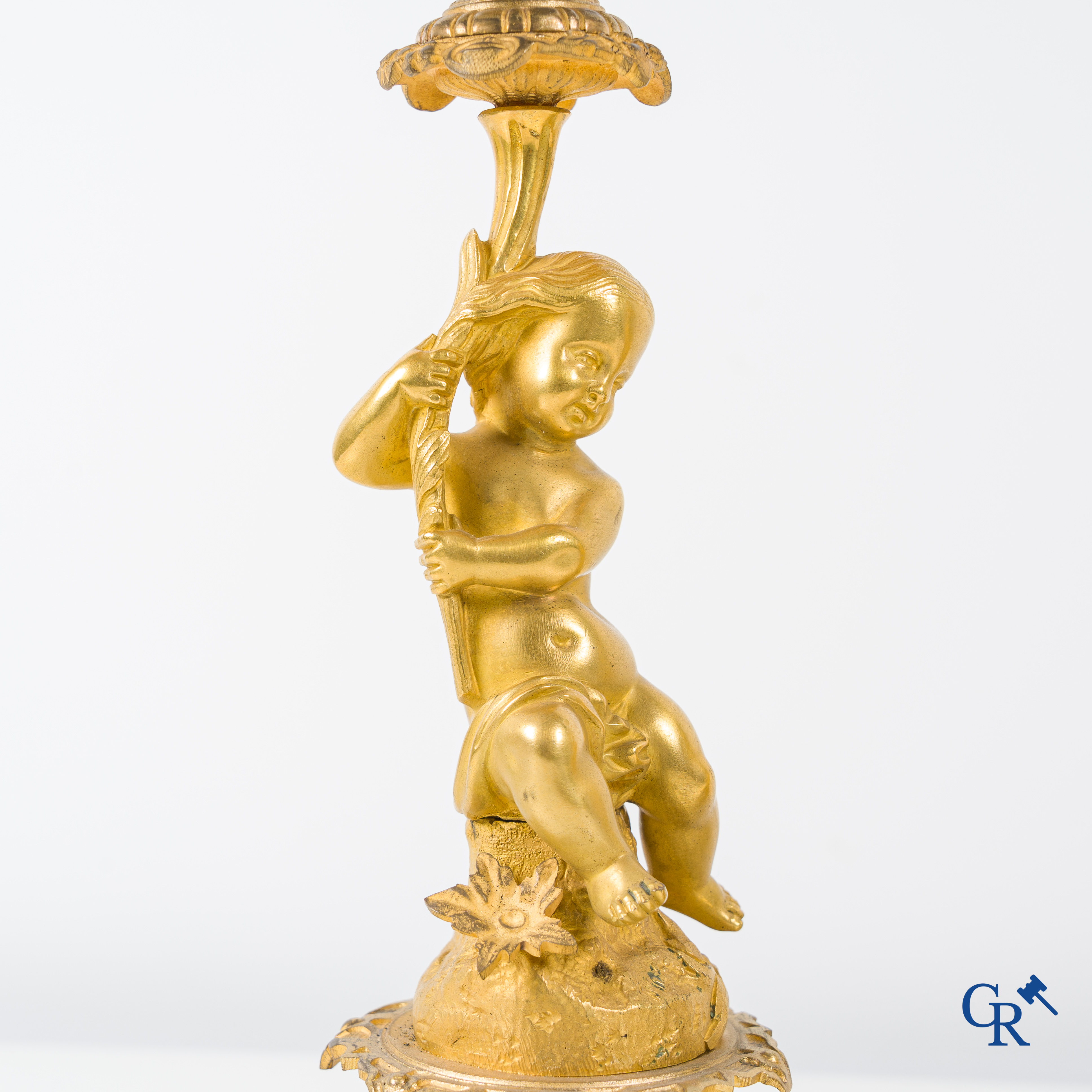 A 3-piece gilded bronze fireplace clockset with Sèvres porcelain.