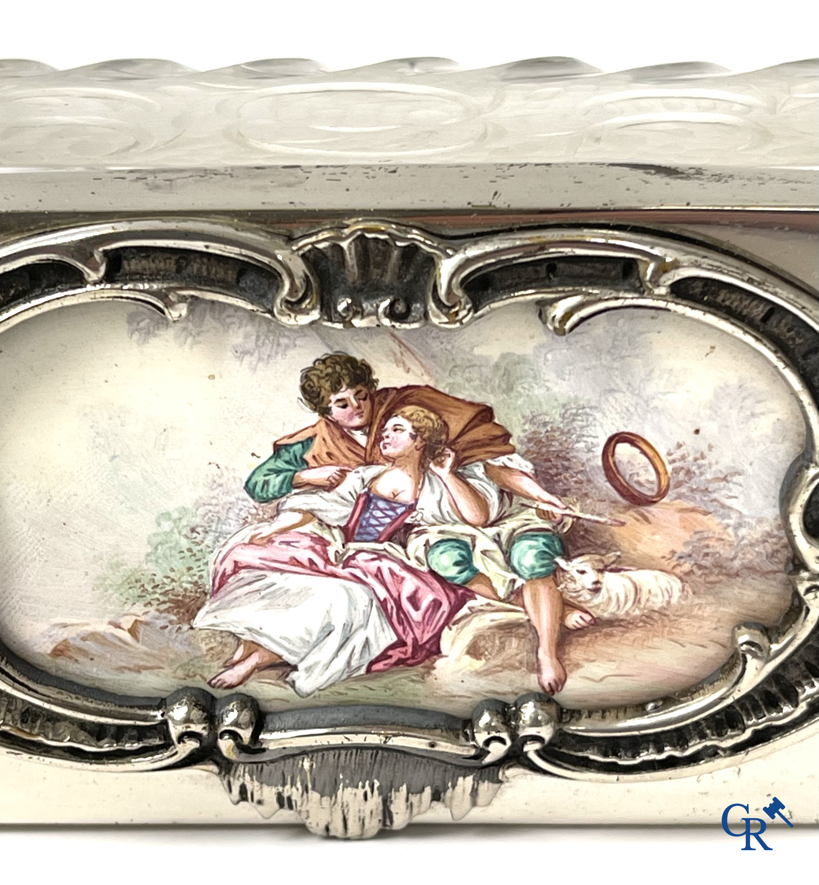 A seven-piece toilet set in silver-plated metal, finely cut crystal and enamelled plaques.