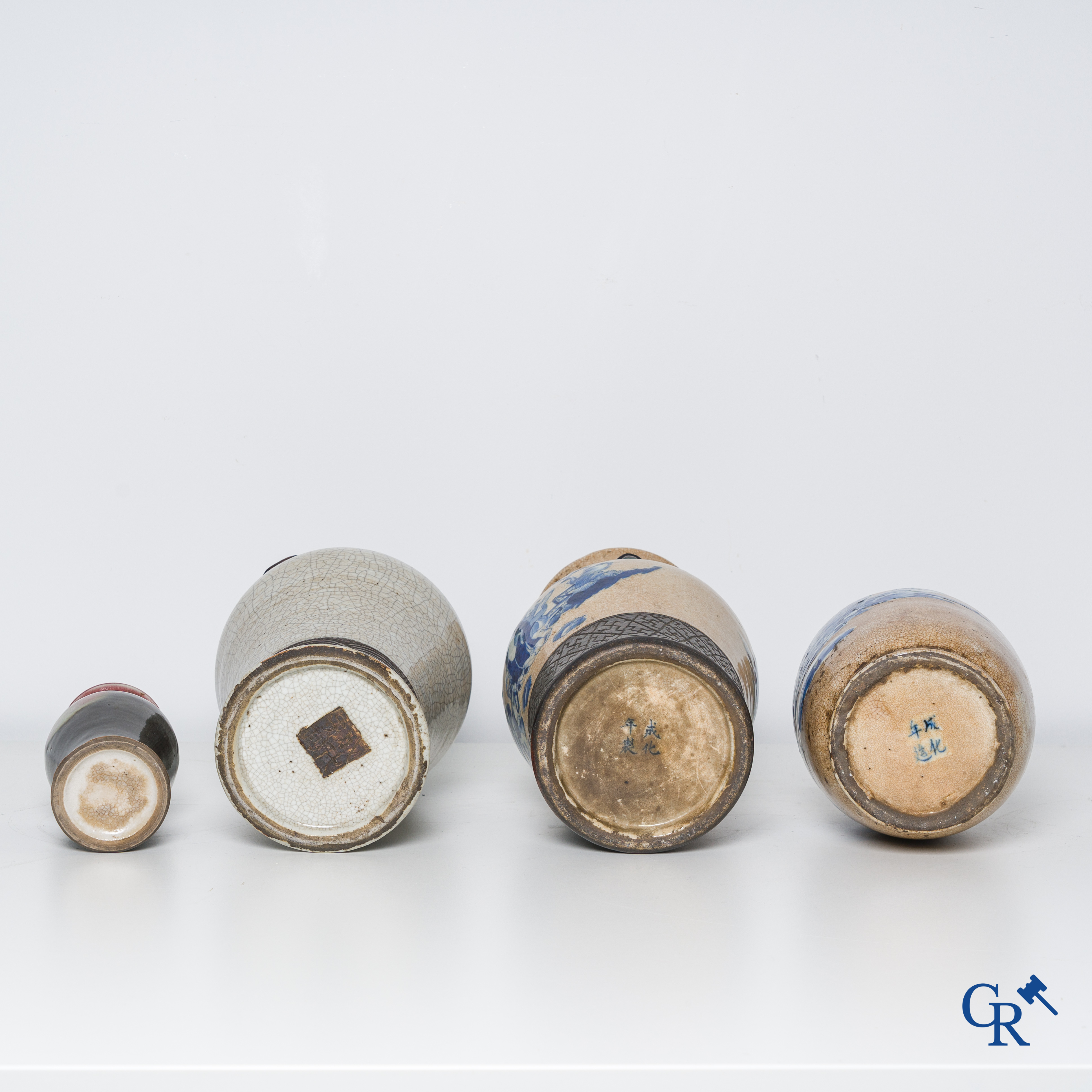 Asian Art, Chinese porcelain, 3 Chinese nanking vases, a red copper decorated vase attached.