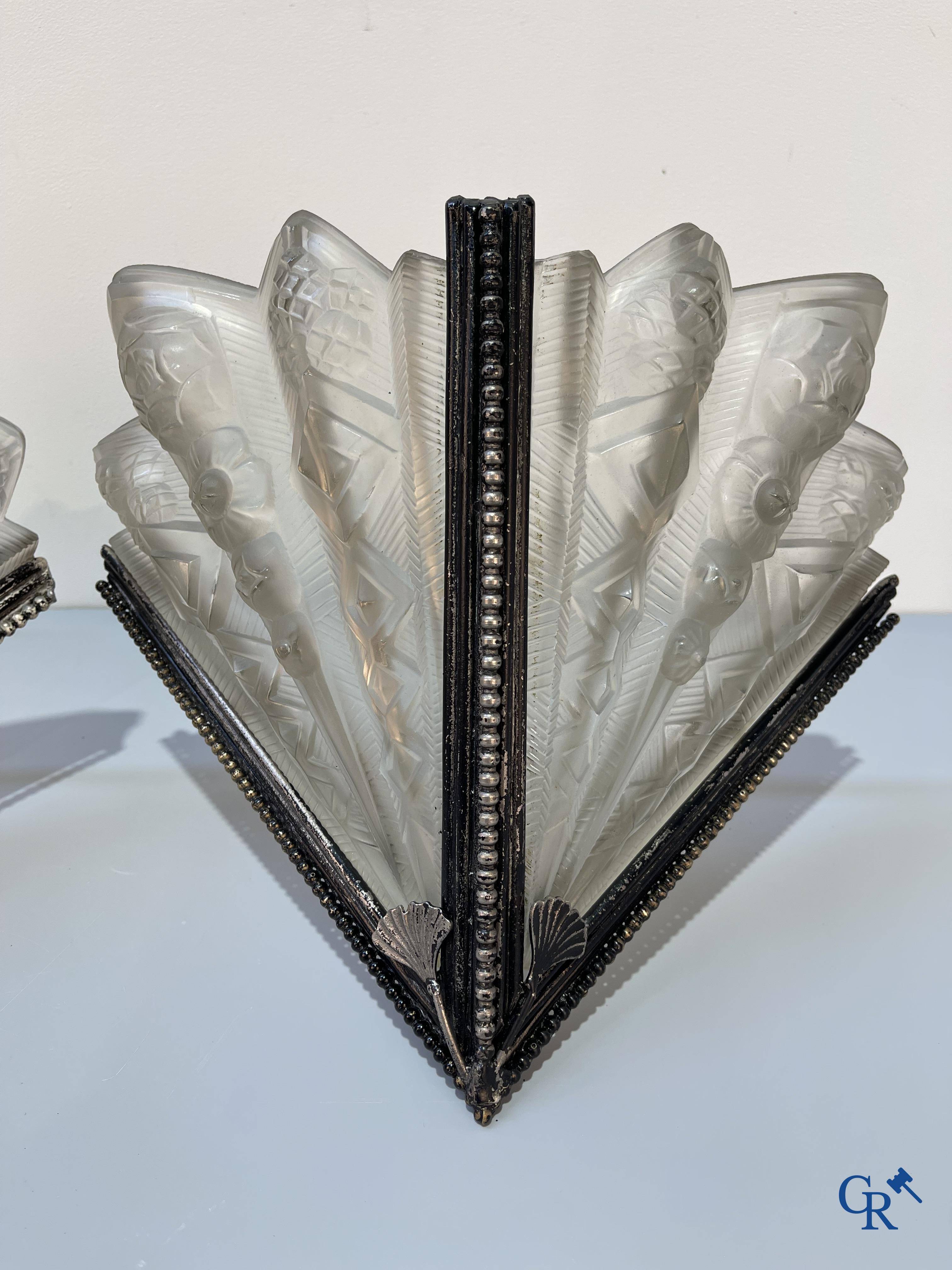 Noverdy France, a large pair of Art Deco wall lights in glass and forging. Circa 1930. Signed.