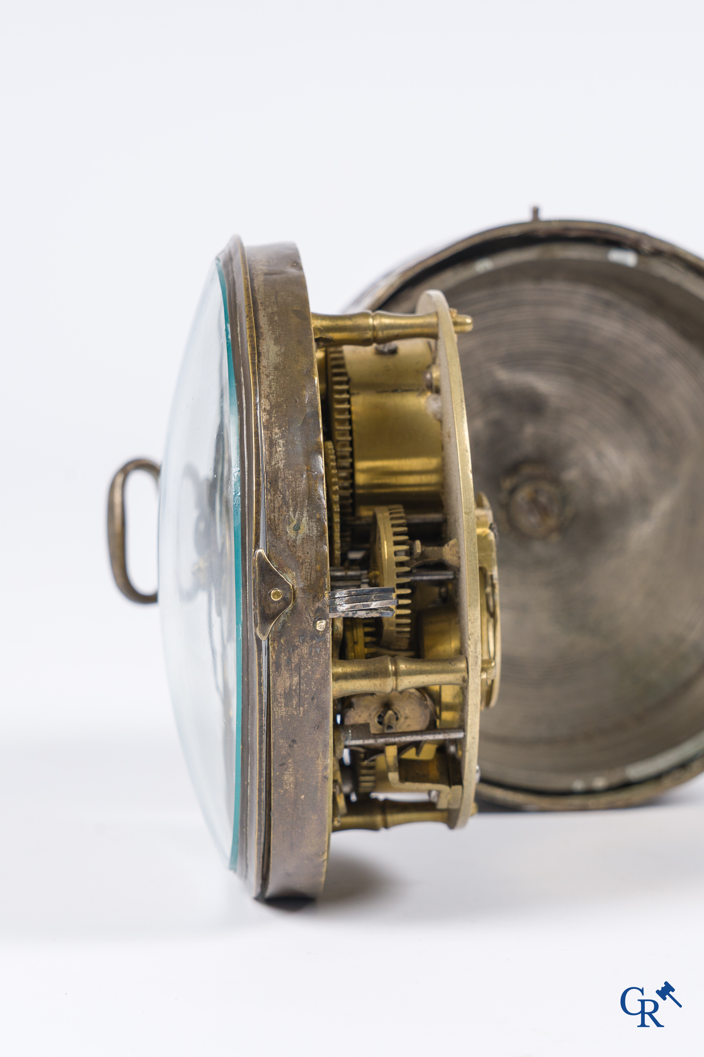 Clocks and watches. Montre de carosse. Large carriage watch with engraved and perforated case. France 17th century.