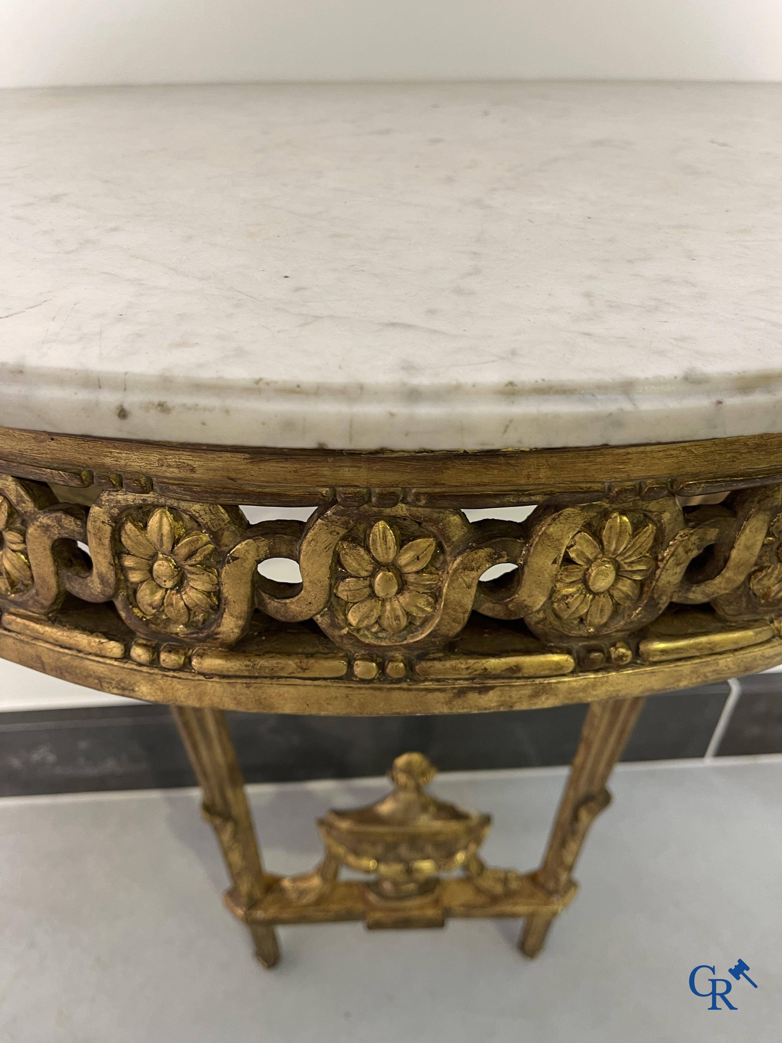 Furniture: Wood sculpted and gilded crescent shaped console. LXVI-period.