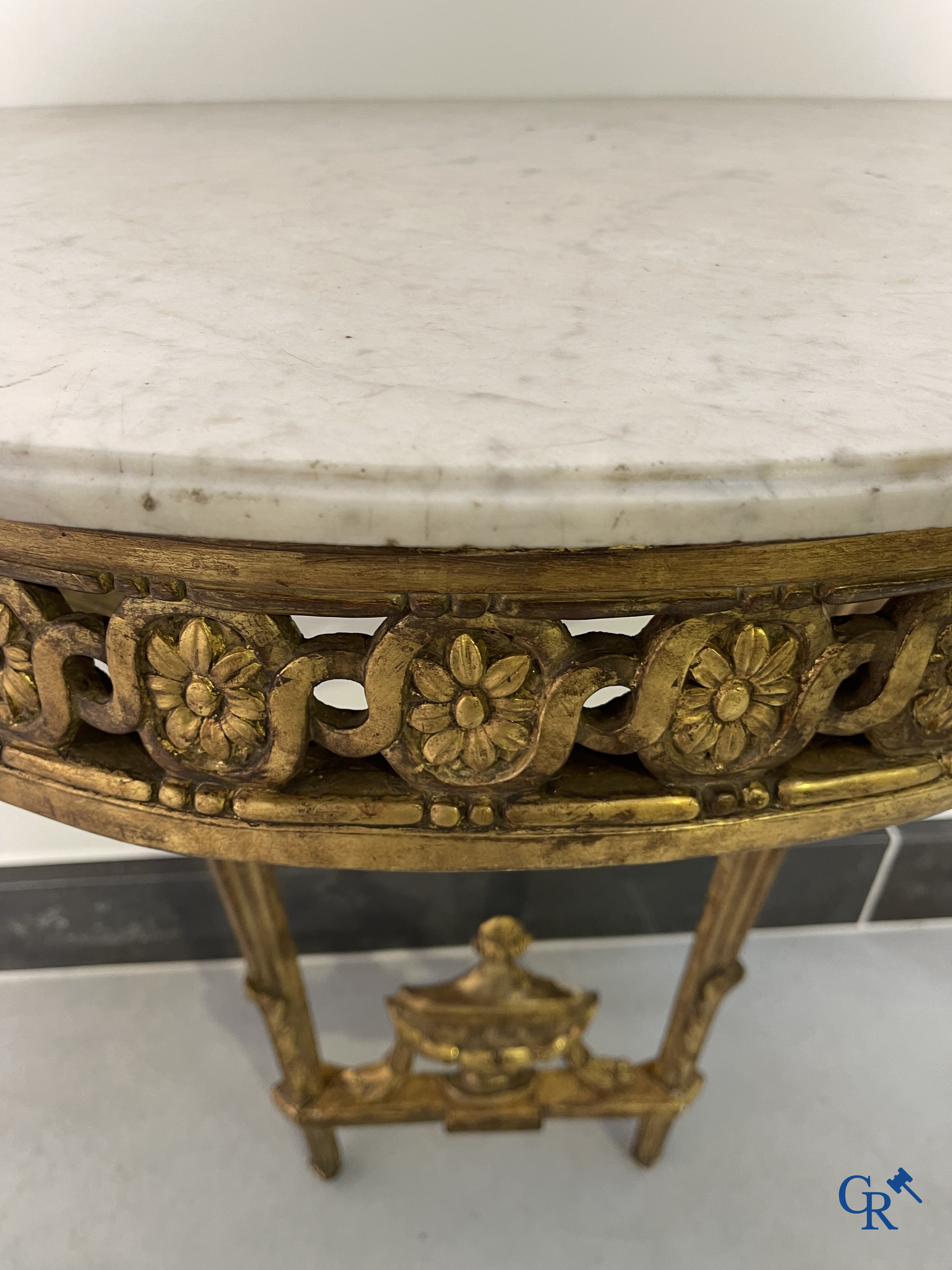 Furniture: Wood sculpted and gilded crescent shaped console. LXVI-period.