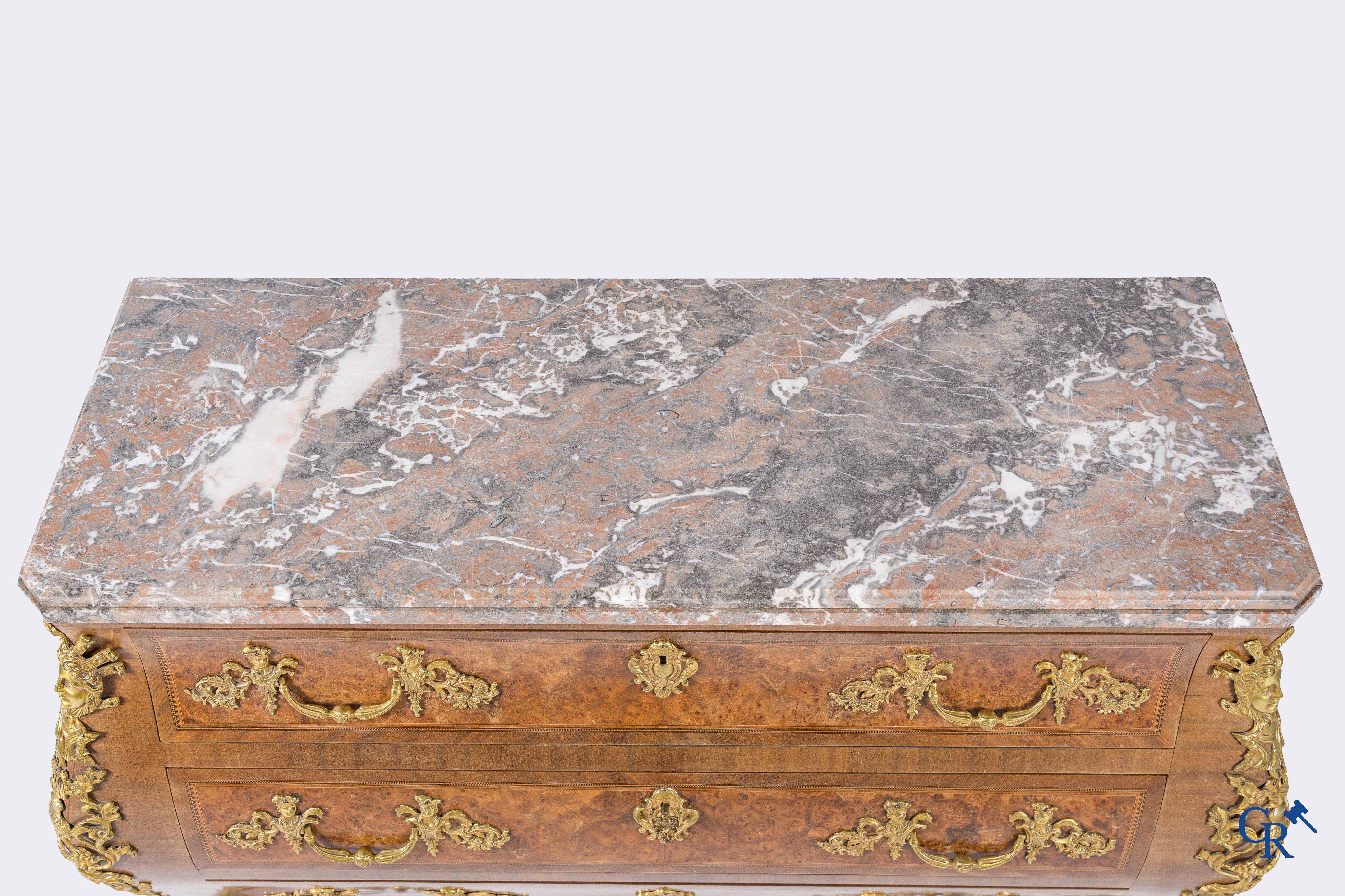 Chest of drawers with bronze fittings and a marble top, LXV style.