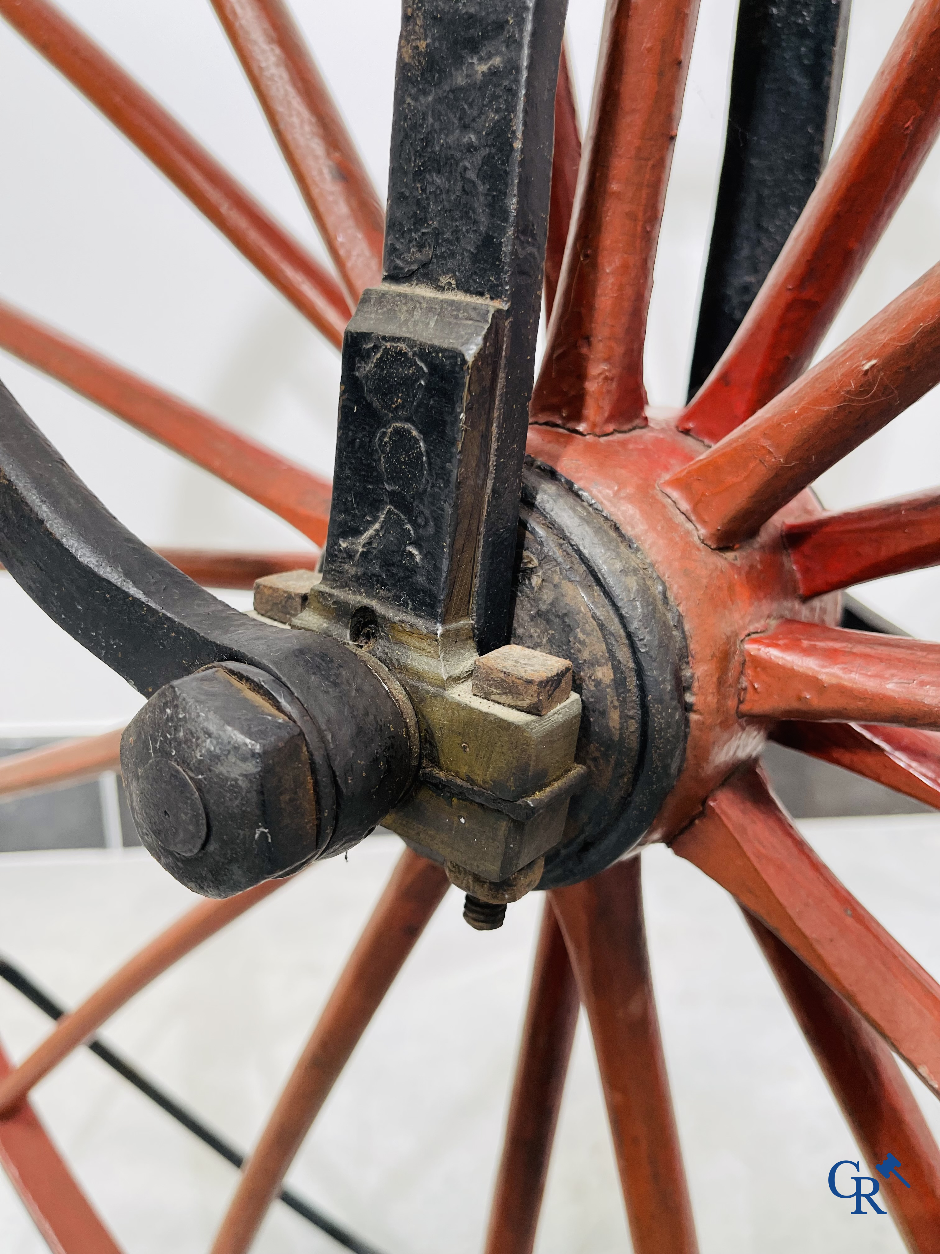 Penny-farthing with wooden spoked wheels on the original wrought iron upright. Circa 1880.