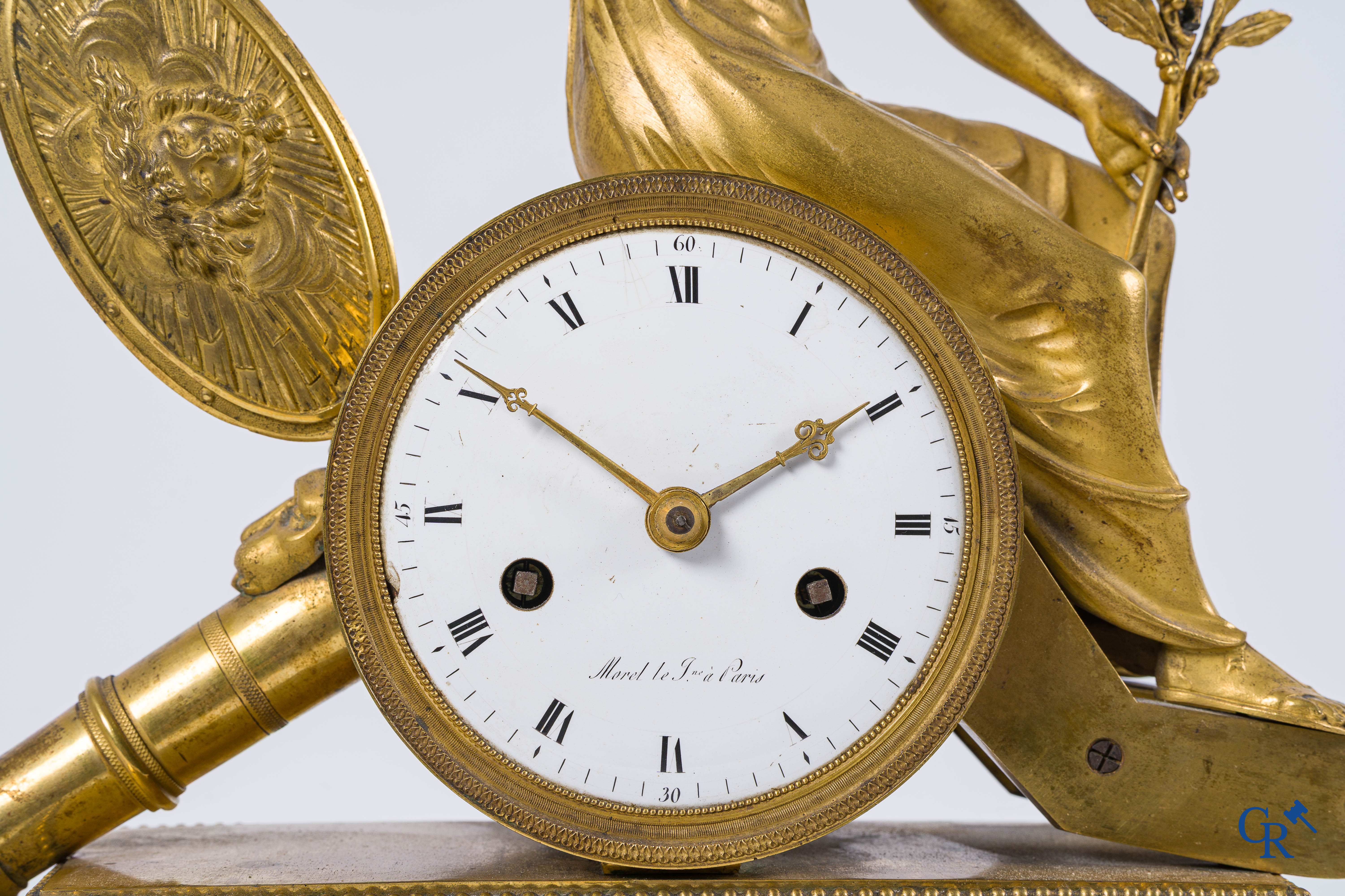Deverberie & Sigisbert-François Michel. Pendule et paire d'aiguières en bronze finement ciselé et doré. Fin du XVIIIème siècle.