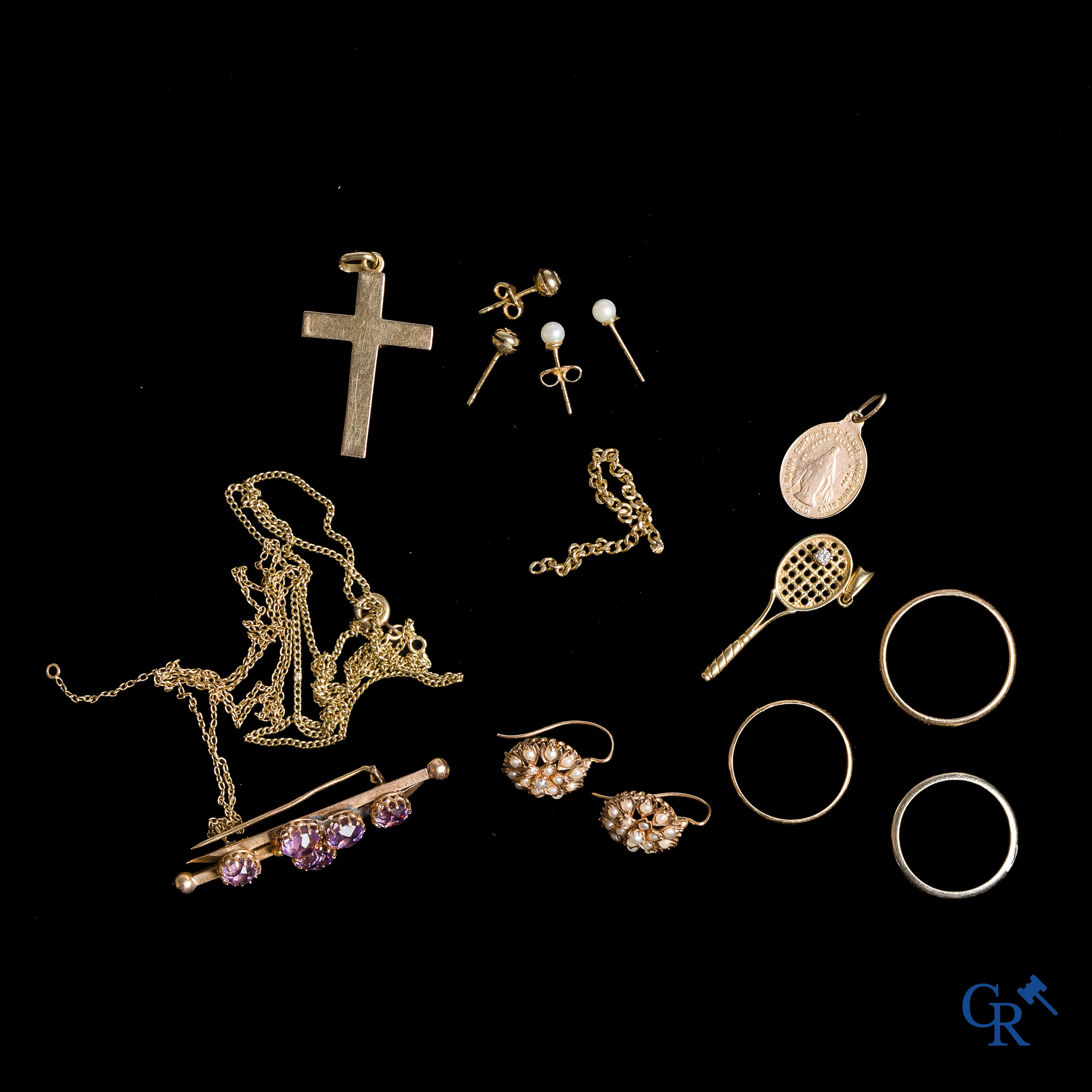 Lot avec divers bijoux en or 18 carats 750°/00.