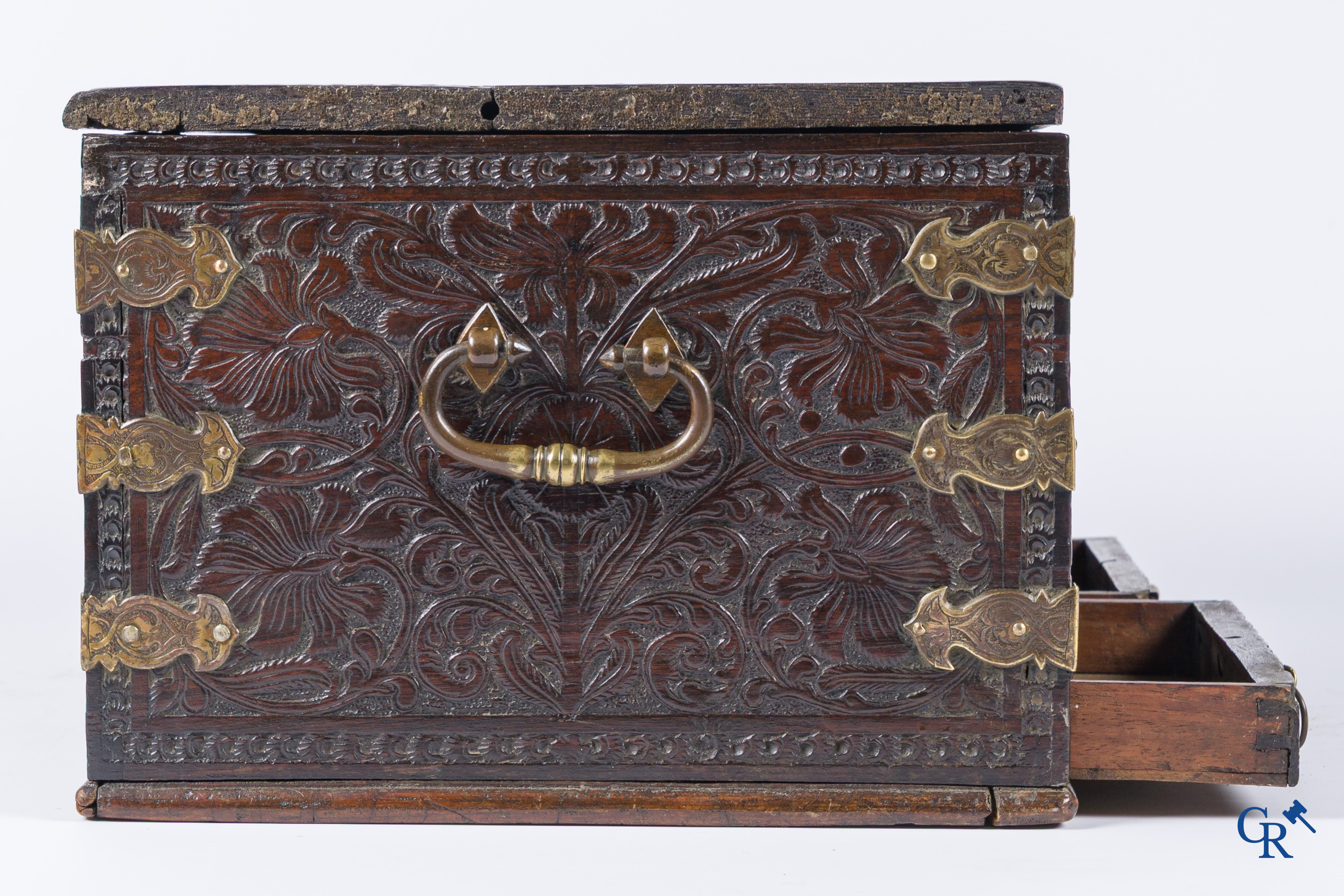 A finely carved colonial small trunk in exotic wood and bronze mounts. 17th-18th century.