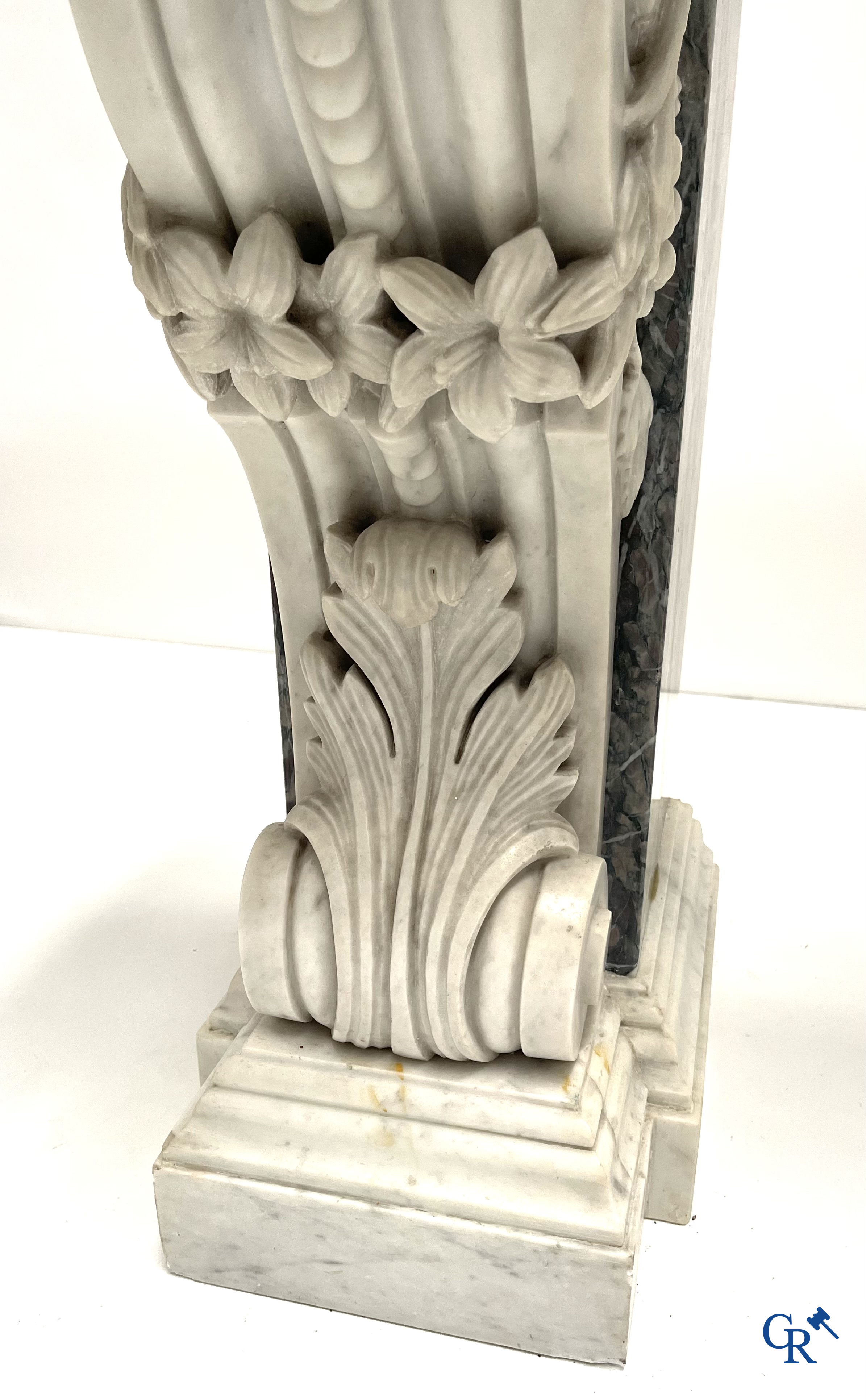 An imposing wall console in multiple types of marble. 19th century.