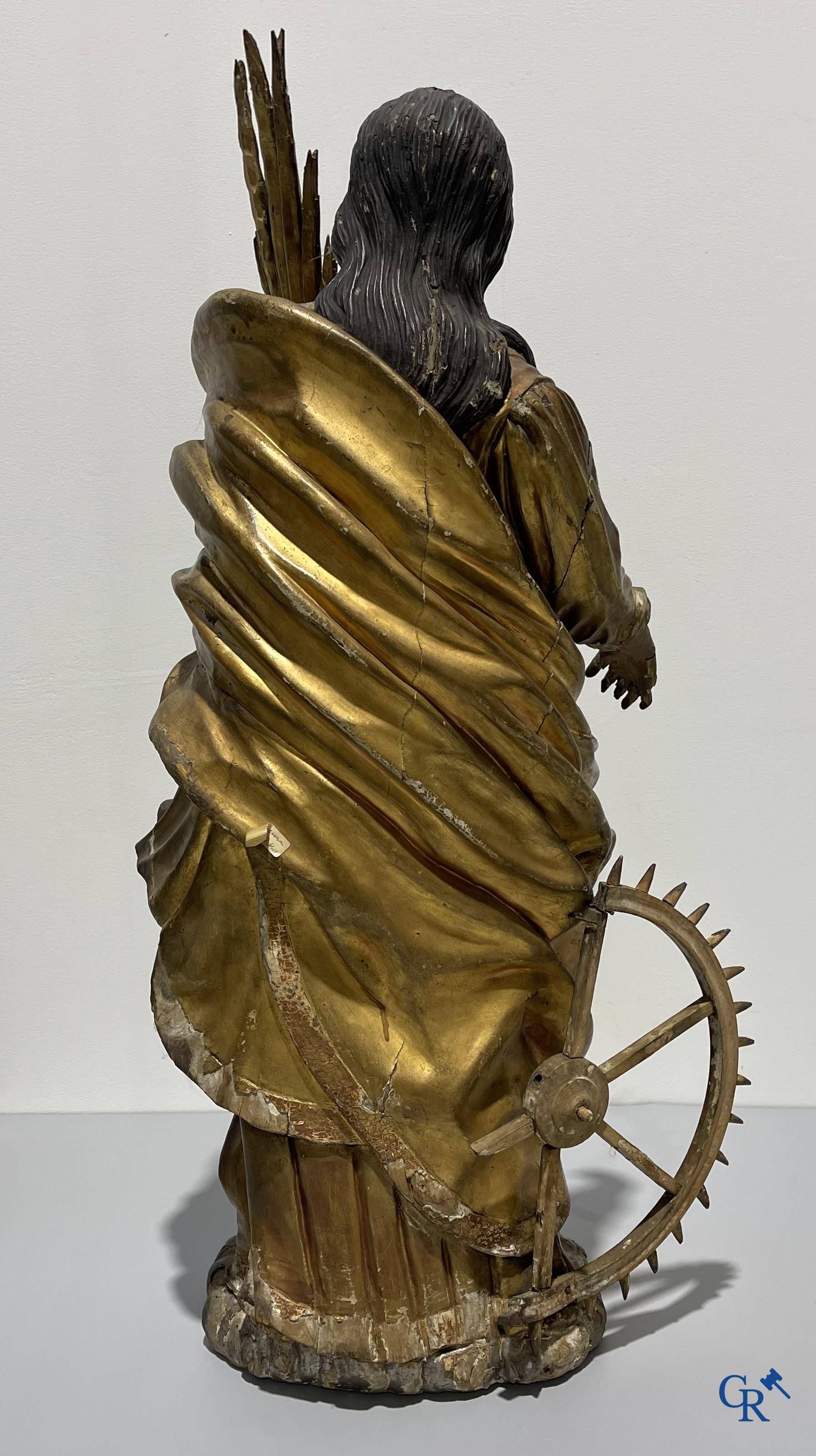 Exceptionally polychrome wooden statue of Saint Catherine of Alexandria with glass eyes, 18th century.