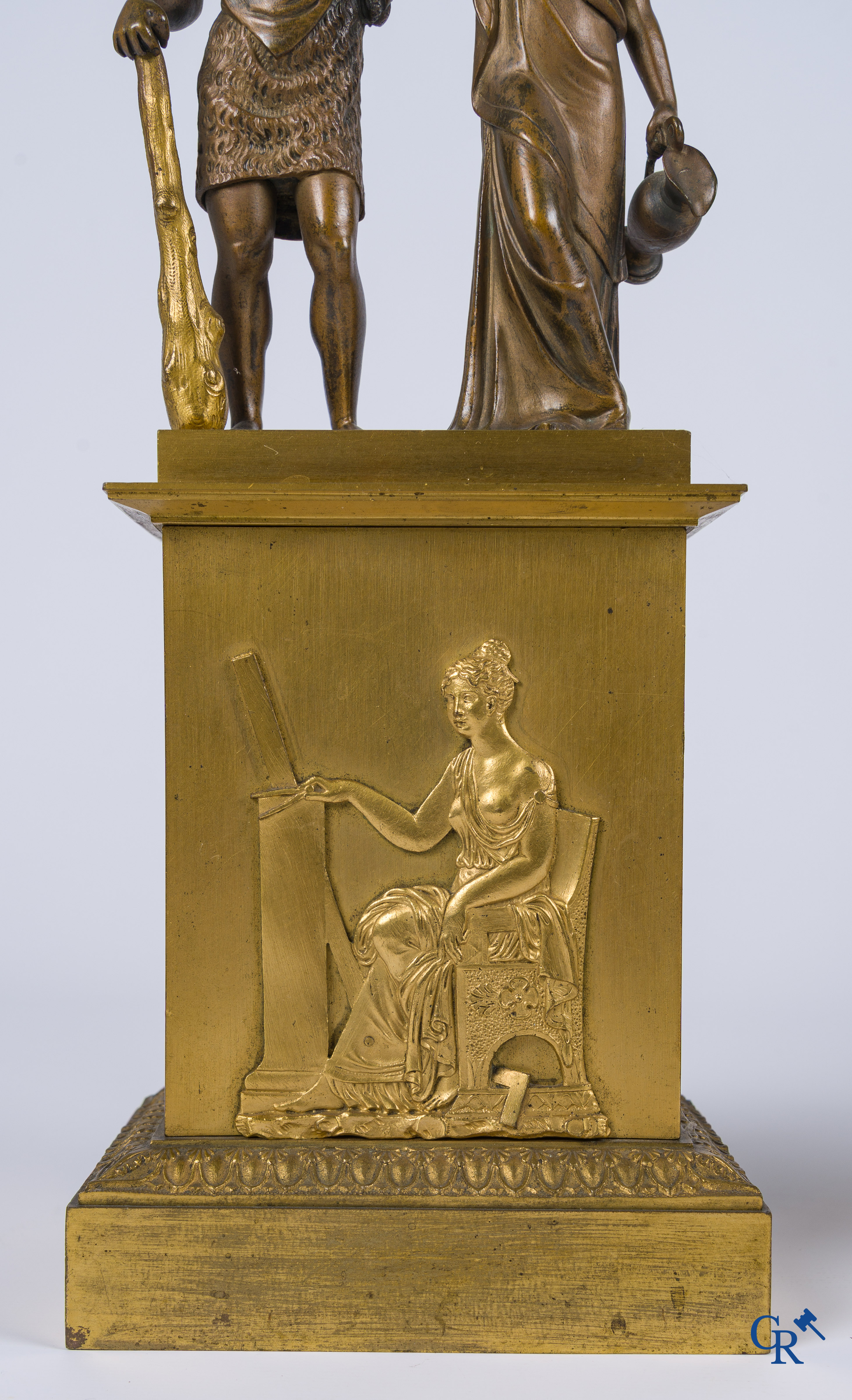 Empire era. A pair of large bronze candlesticks with characters in the antique style. Empire, circa 1815.