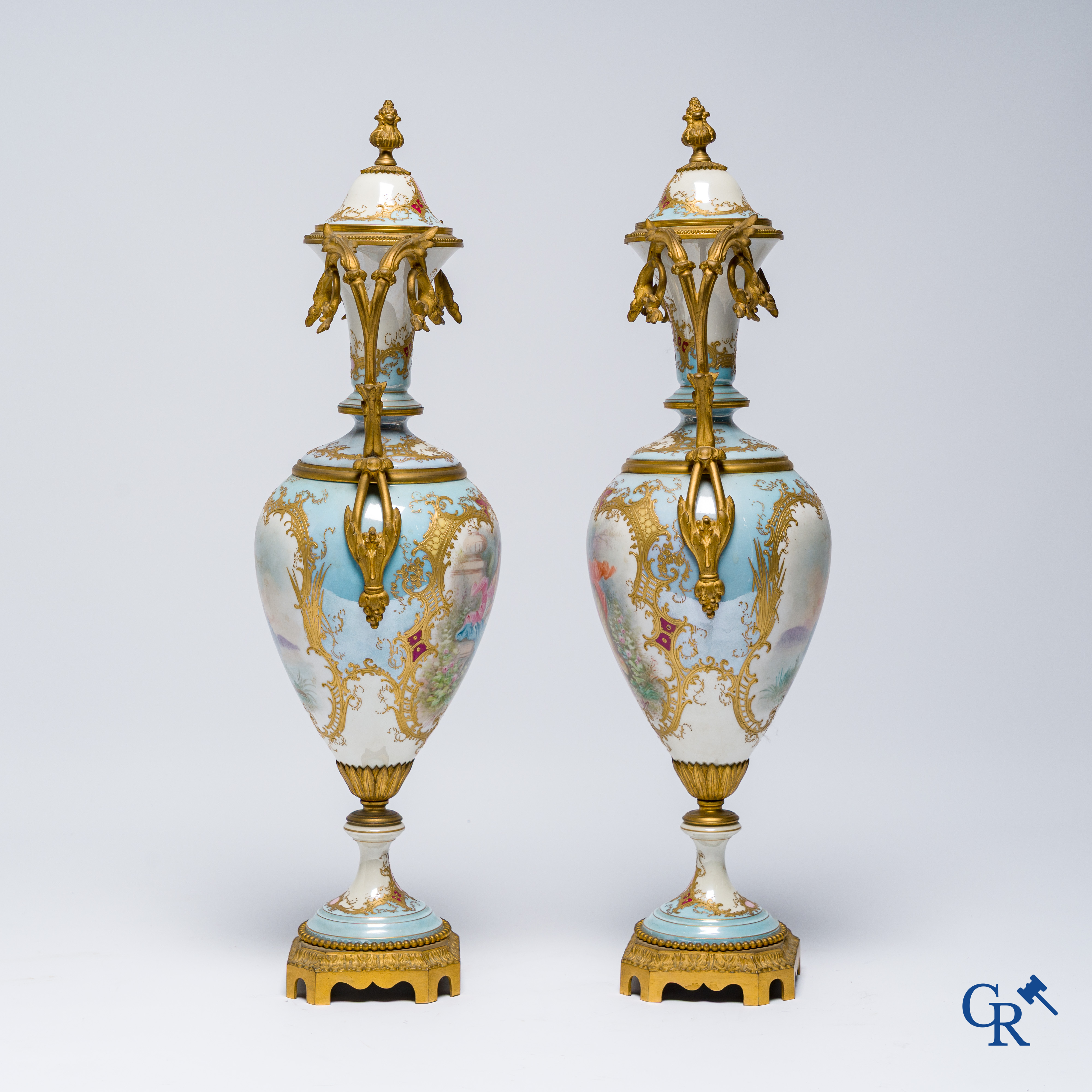 Sèvres, Château des Tuileries, pair of lid vases in light blue porcelain and bronze frame. LXVI style.