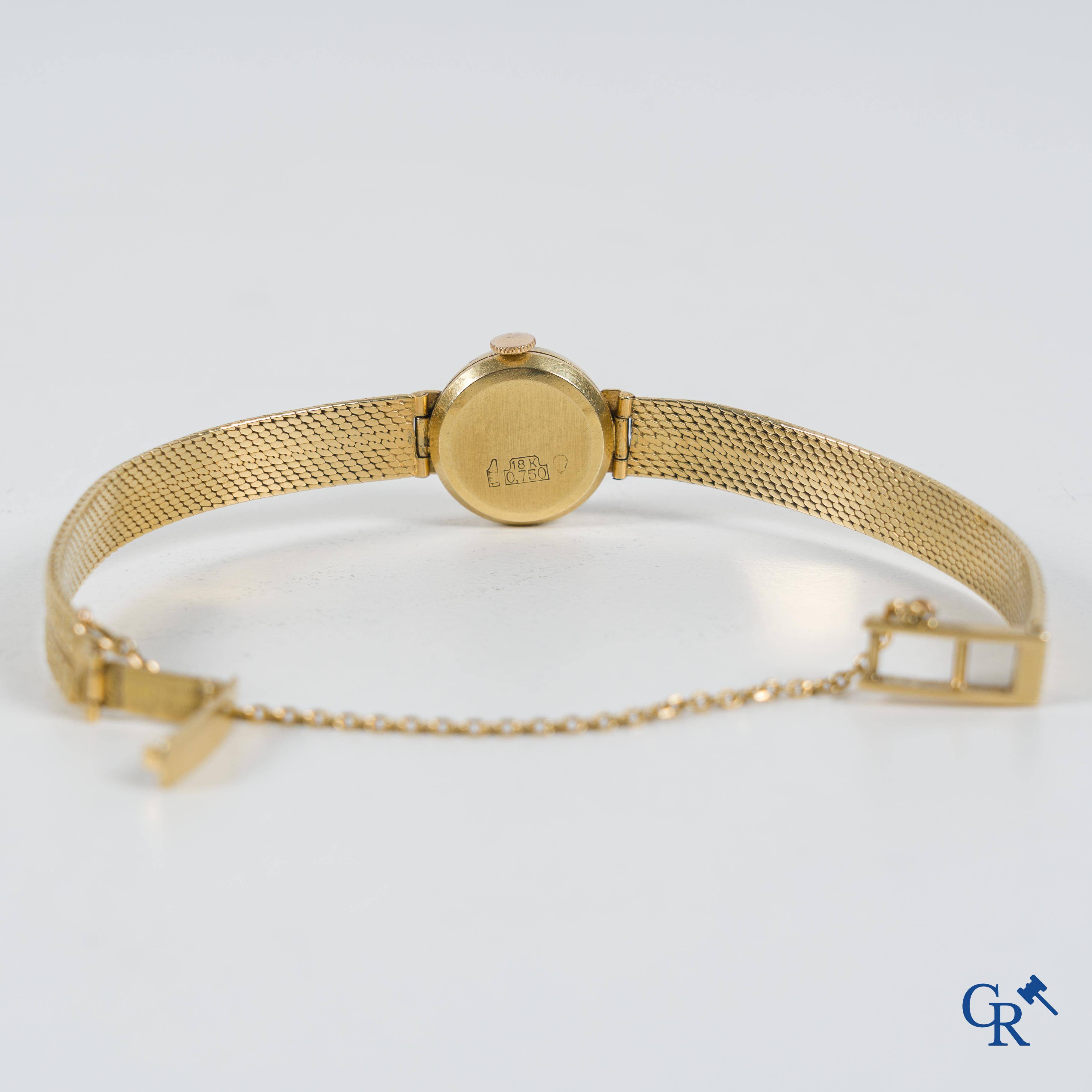 Montres, une montre bracelet femme Britix en or jaune 750°/00. Travail Suisse.