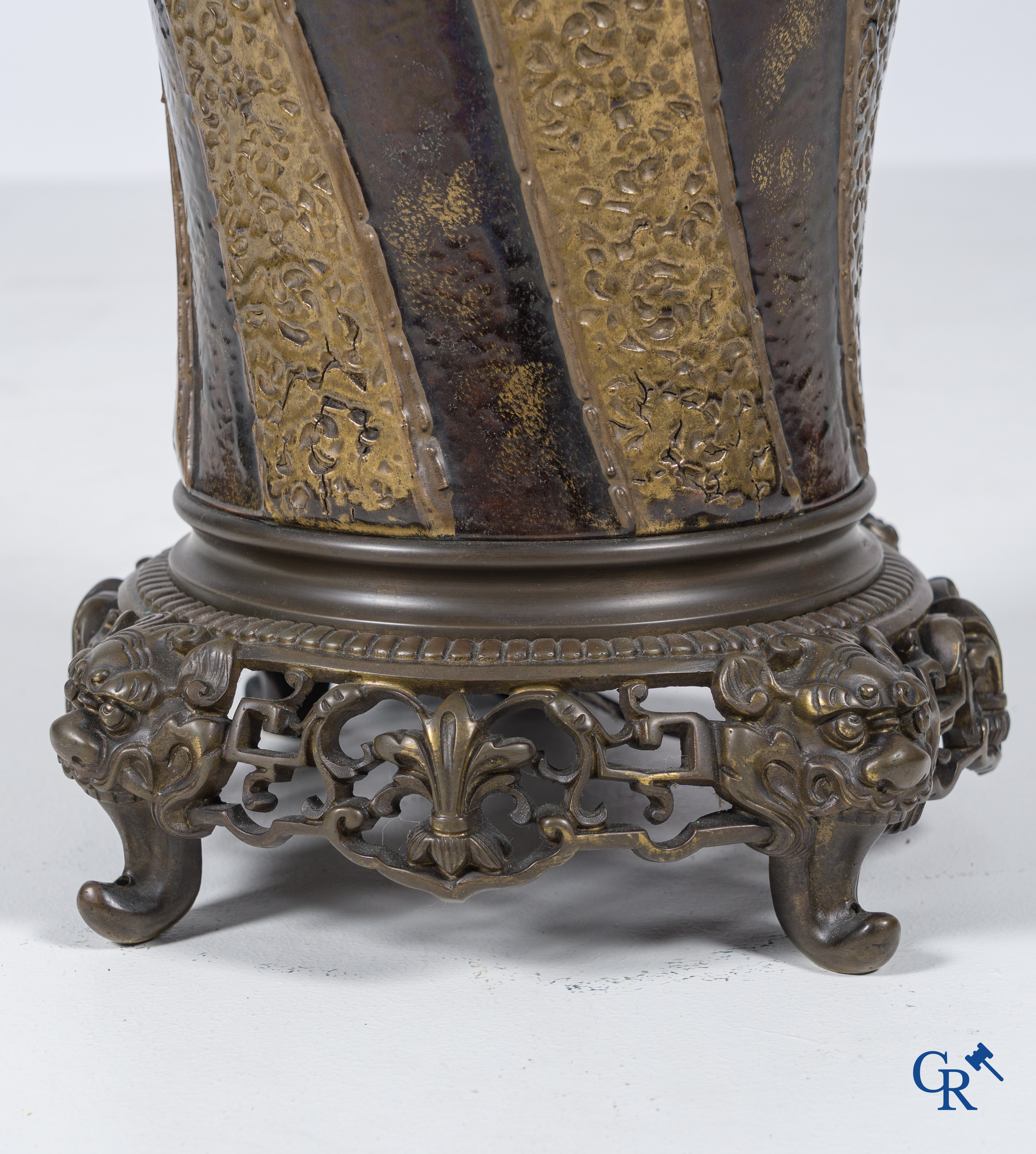 An imposing vase in French faience with bronze frames in Japonizing style mounted as a lamp. Circa 1890.