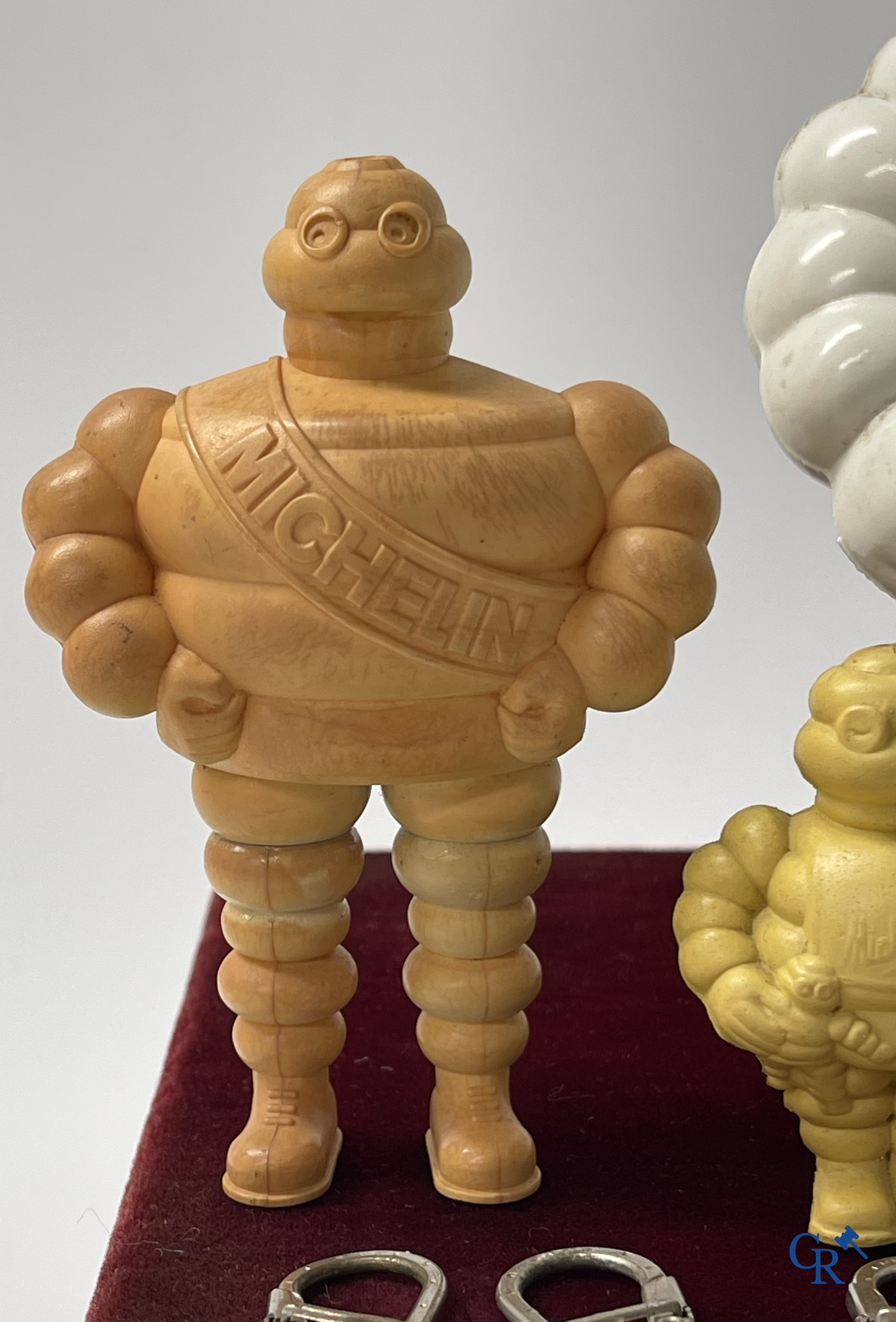 Michelin, a lot with various Bibendum figures and publicity keychains for Michelin tyres. 1950's and 1960's.