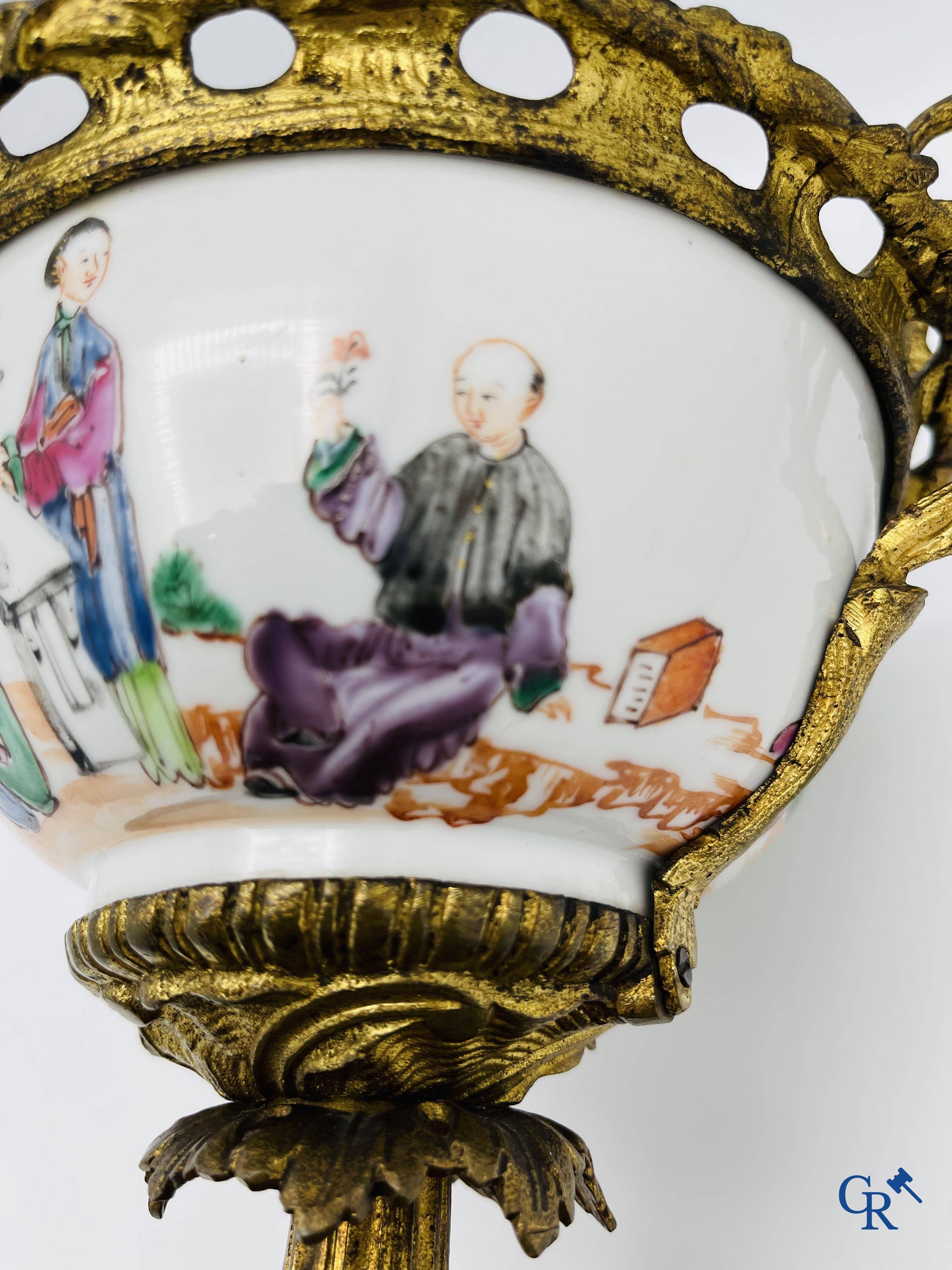 Chinese porcelain: An 18th century gilt-bronze mounted bowl in Chinese export porcelain.