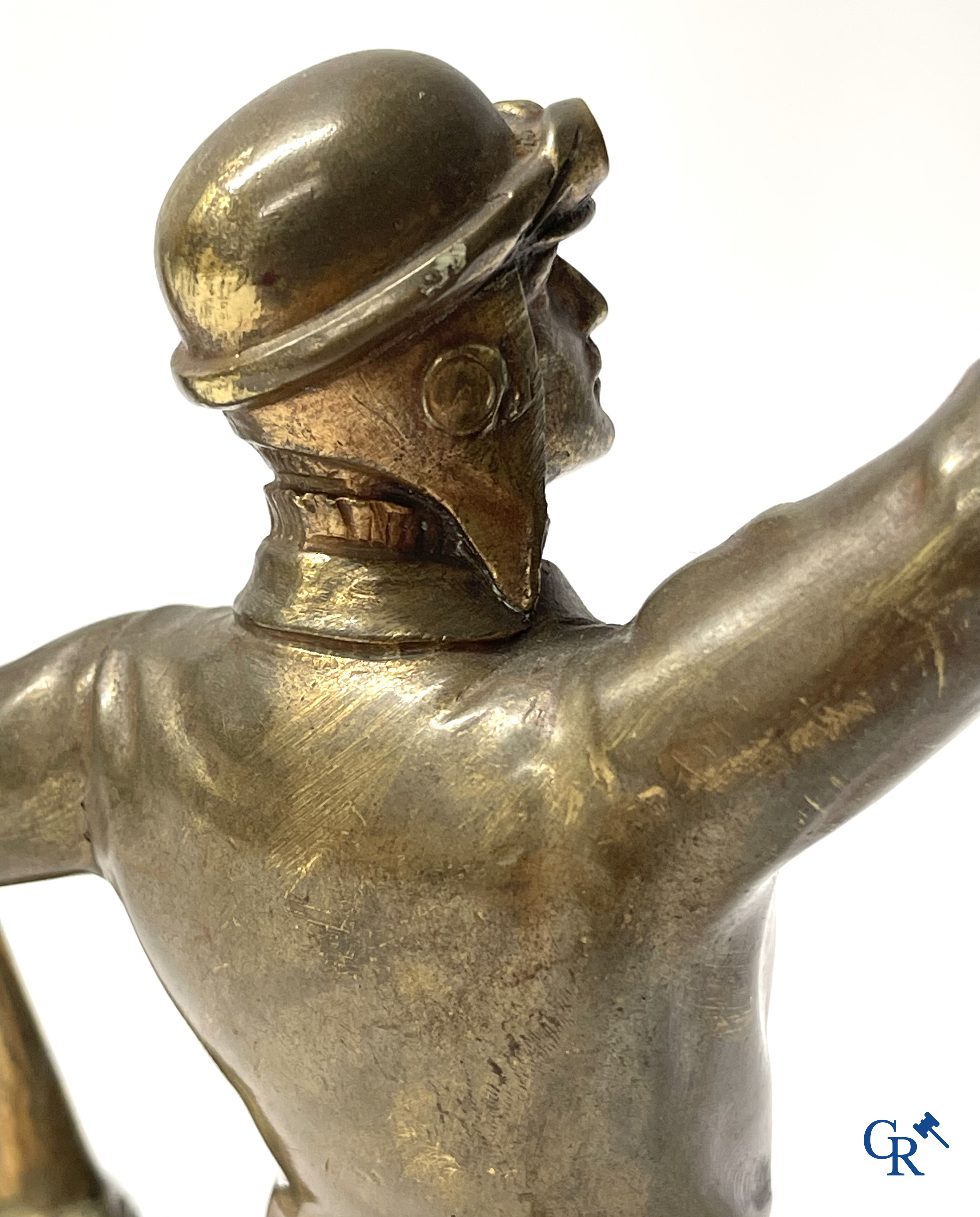 Aeronautics, a bronze representation of an aircraft pilot with propeller. Around 1930.