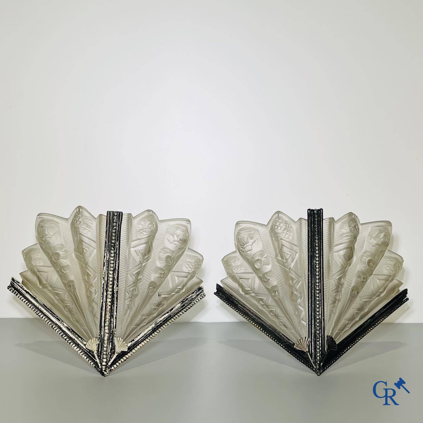 Noverdy France, a large pair of Art Deco wall lights in glass and forging. Circa 1930. Signed.