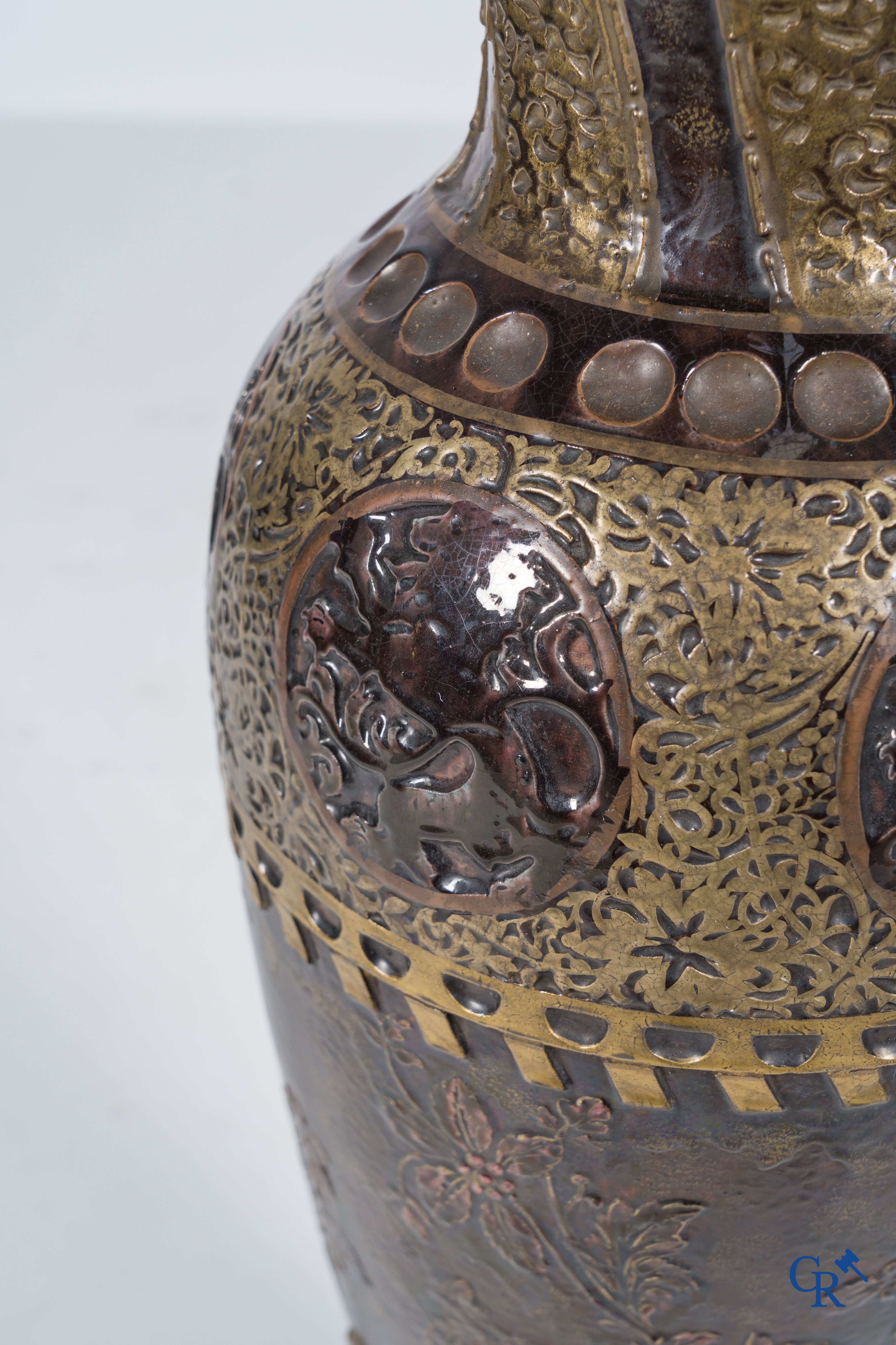 An imposing vase in French faience with bronze frames in Japonizing style mounted as a lamp. Circa 1890.