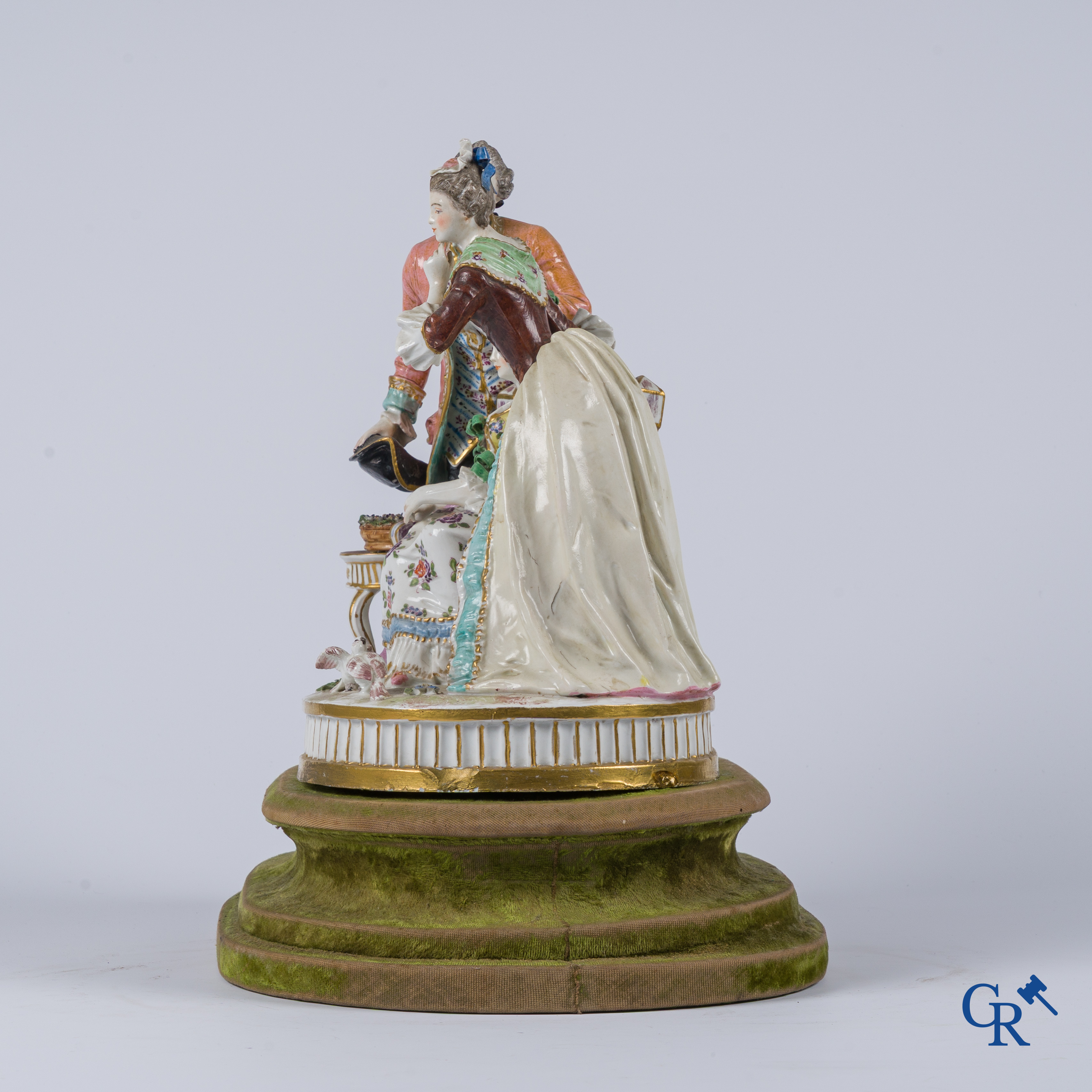 Porcelain. An exceptional group in multi-coloured and gilded porcelain. Marked. 19th century.