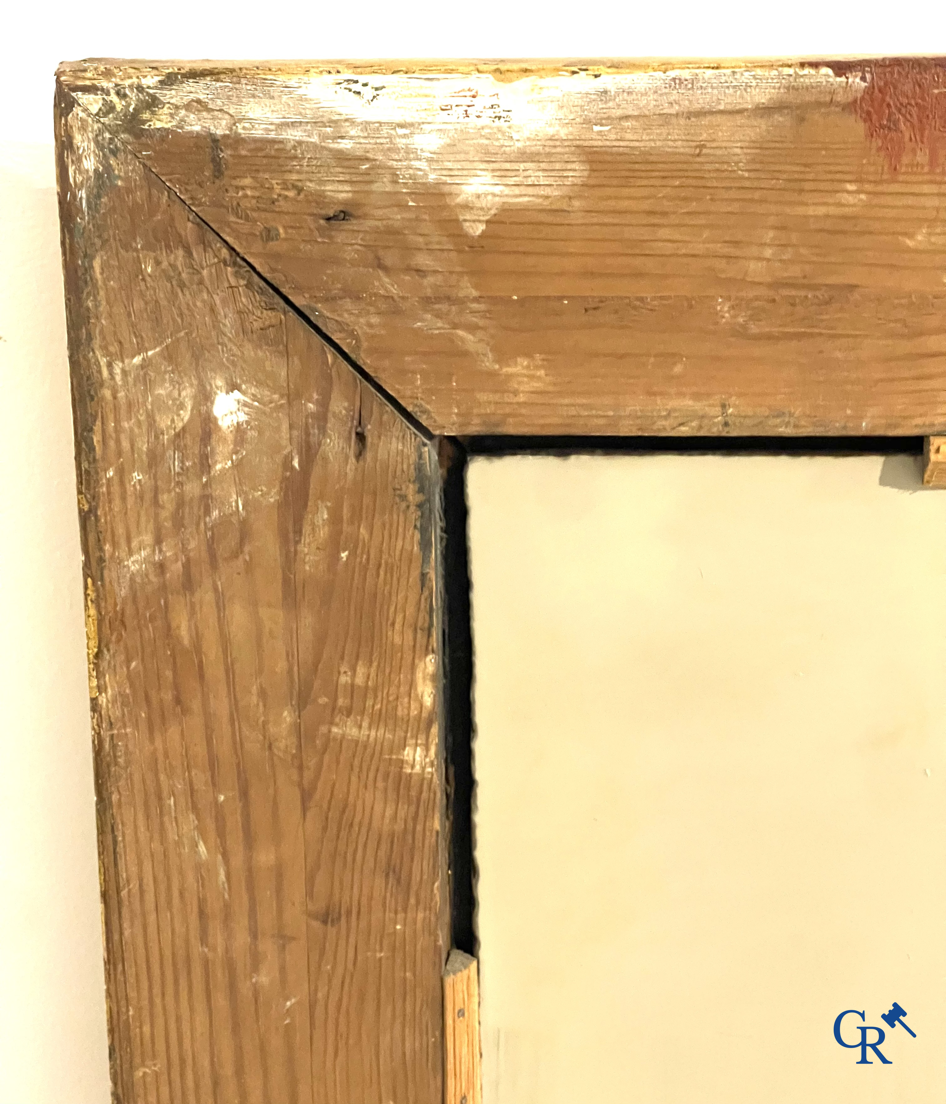 A large gilded fireplace mirror in LXVI style. Circa 1920.