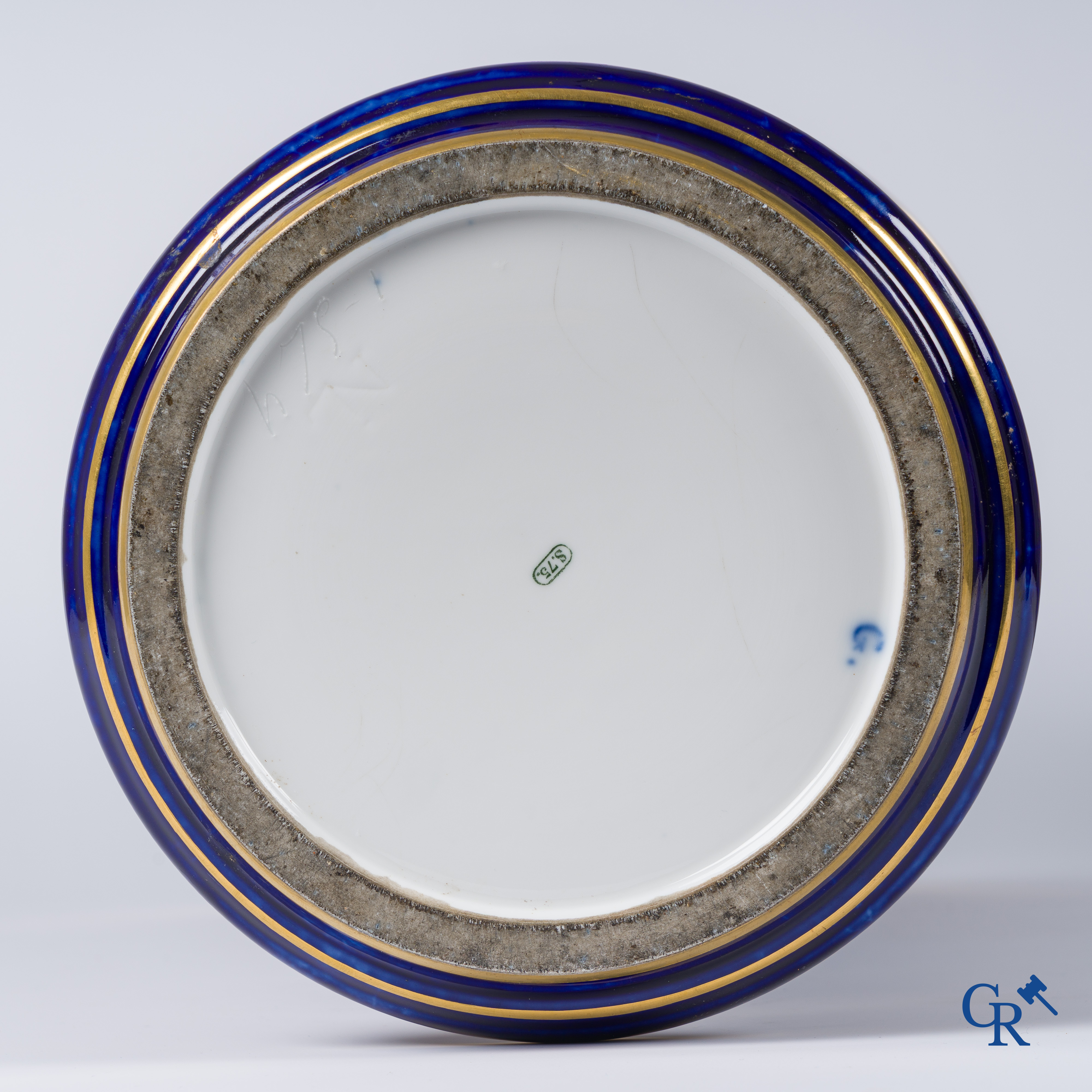 Manufacture Nationale de Sèvres. important vase with a gilded decor on a blue background colour.