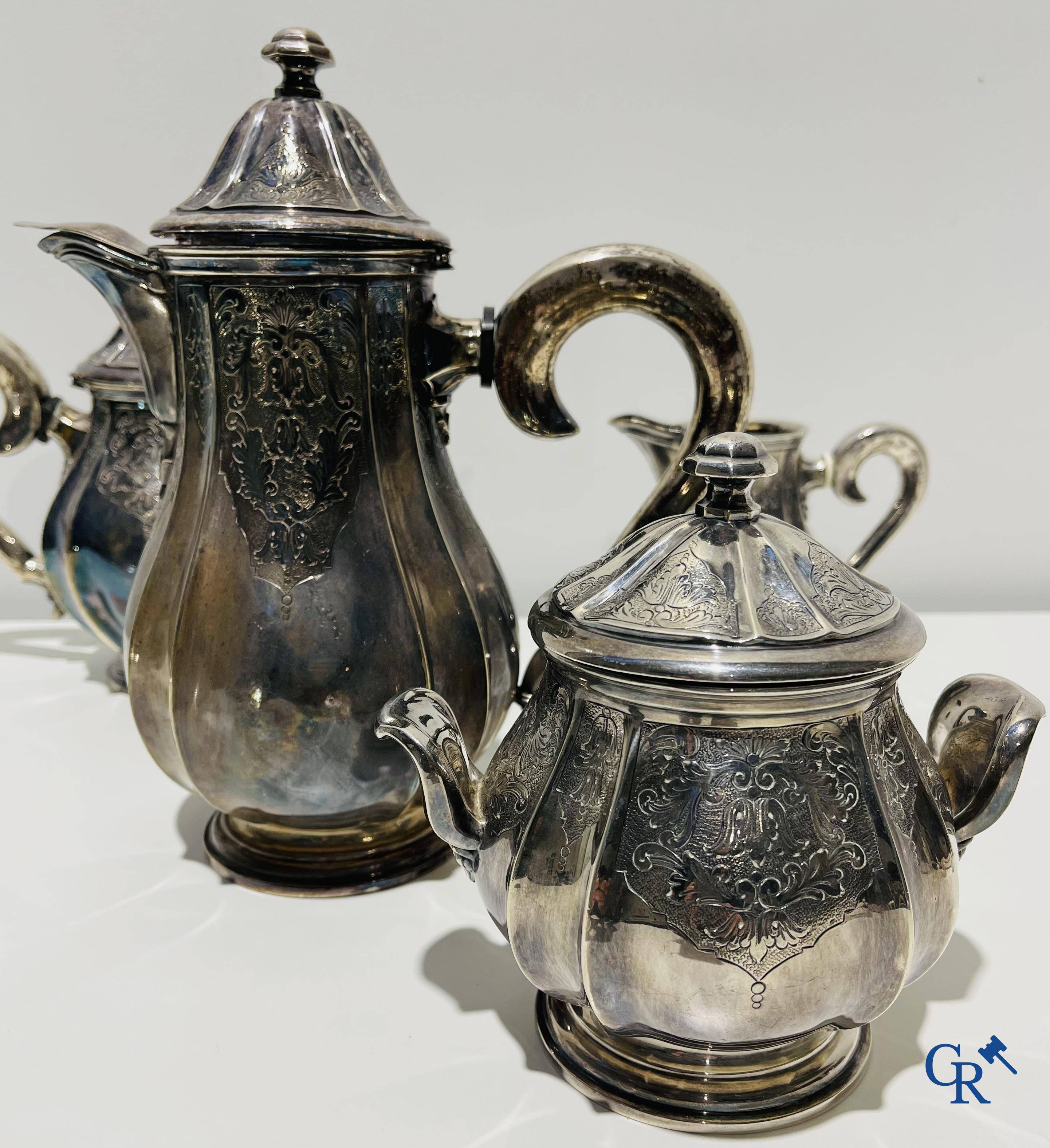 Un service à café et à thé 5 pièces en argent 835°/00.