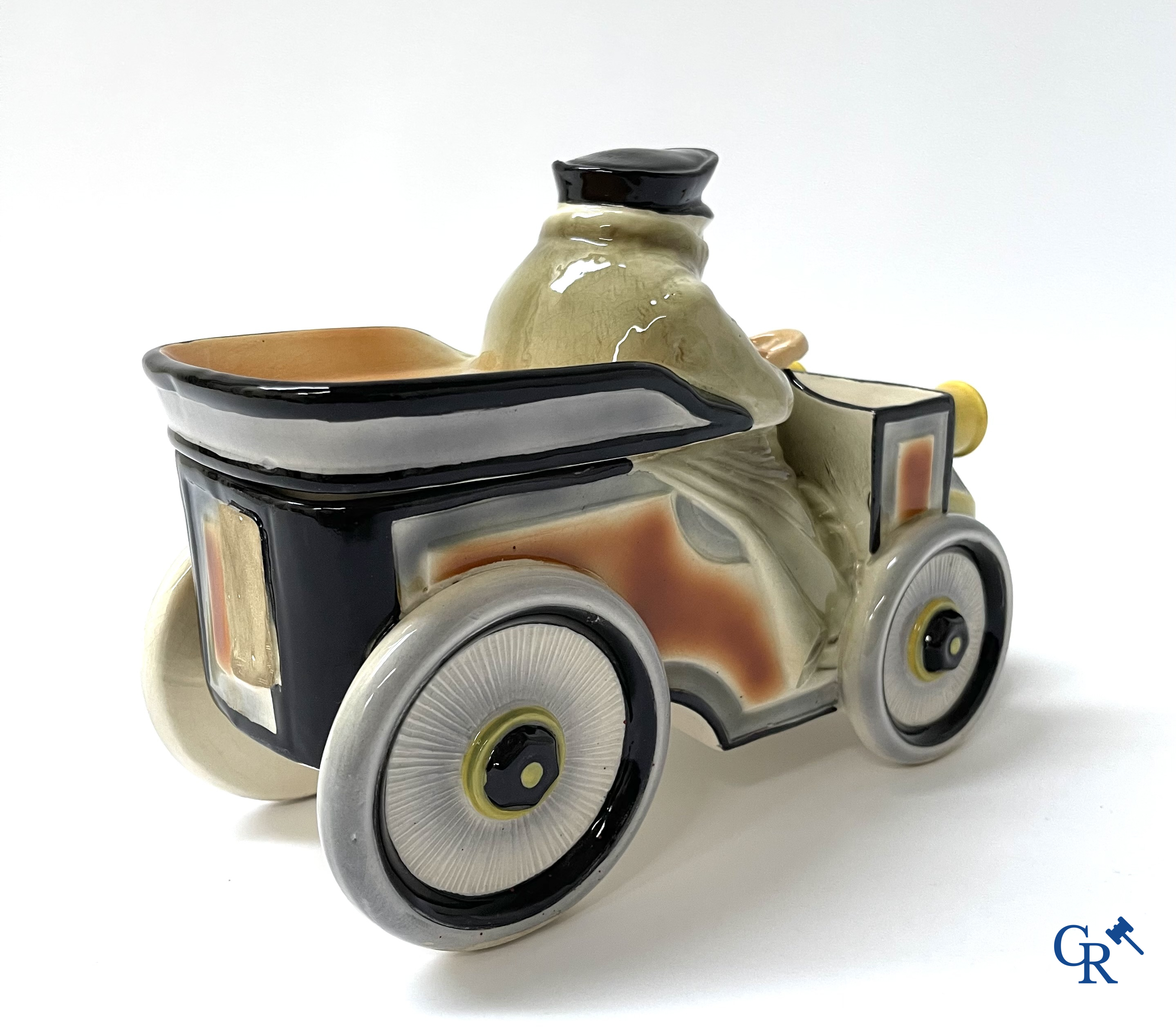 Faïencerie Fives Lille. L'Automobiliste, a large tobacco jar in the shape of a vintage car with a driver. Around 1910.