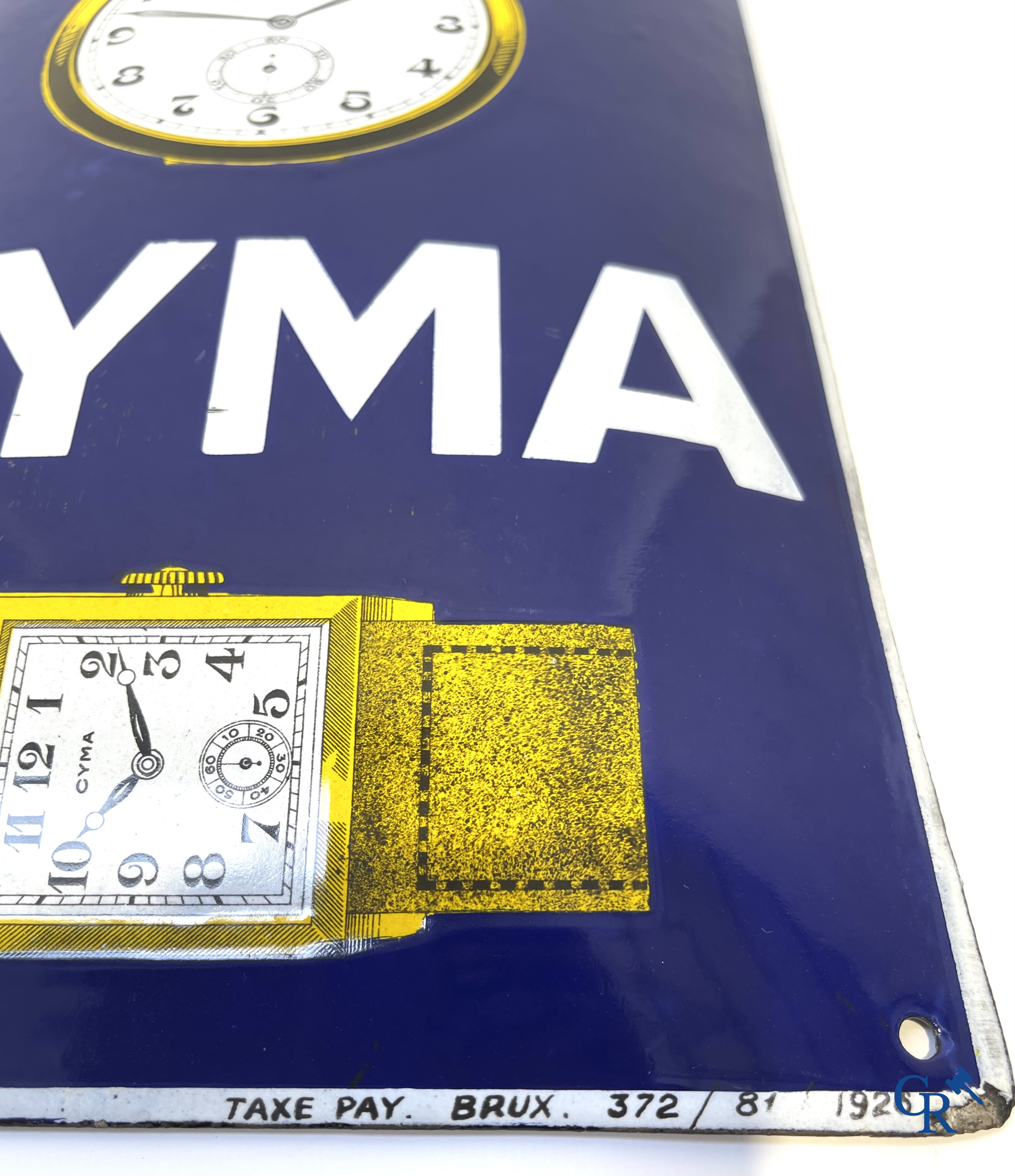 Tavannes Watch Company. Bombed enamel advertising sign for Cyma wrist and pocket watches. 1926.