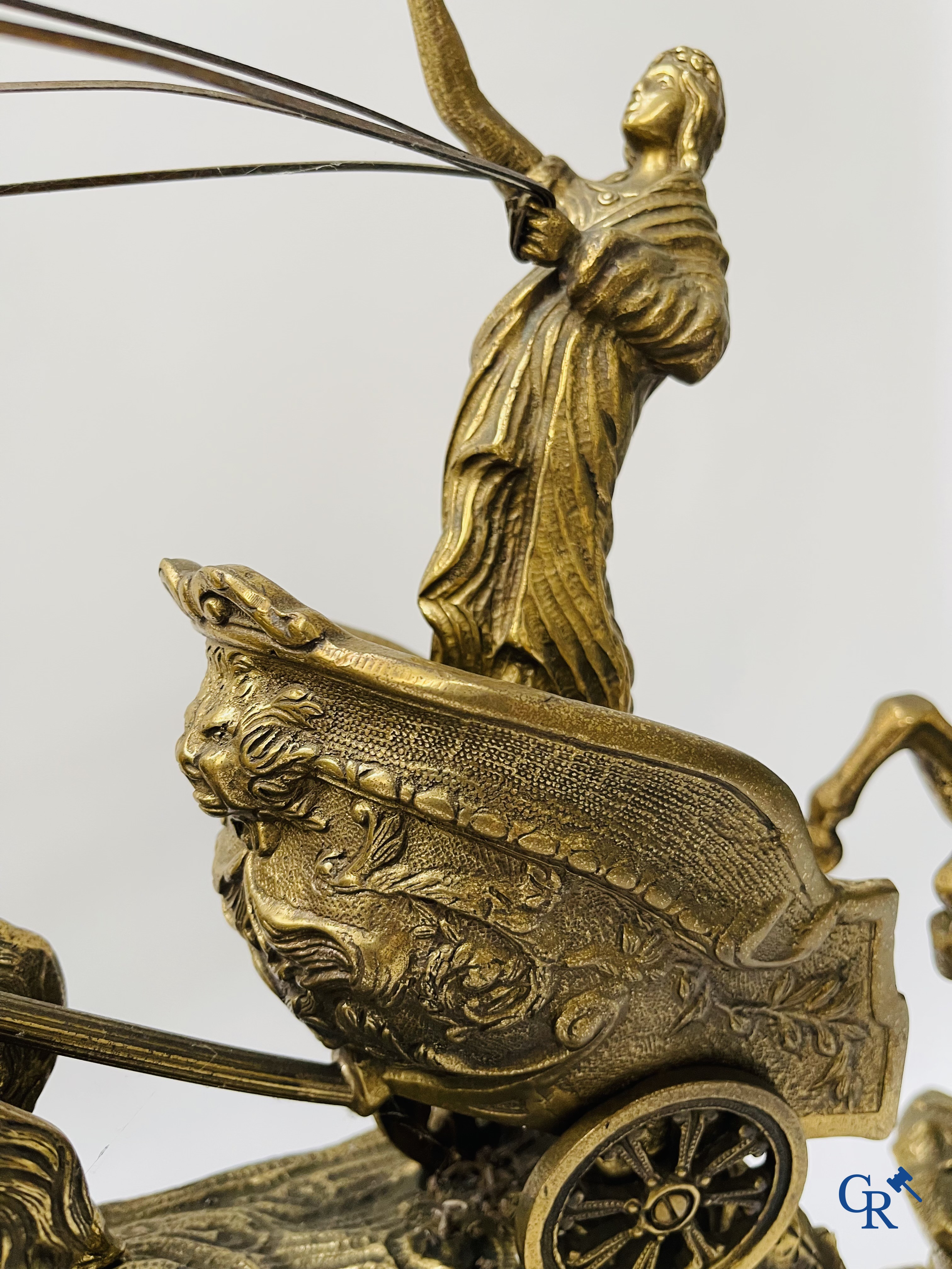 Large 3-piece clockset in bronze. "Chariot". 20th century.