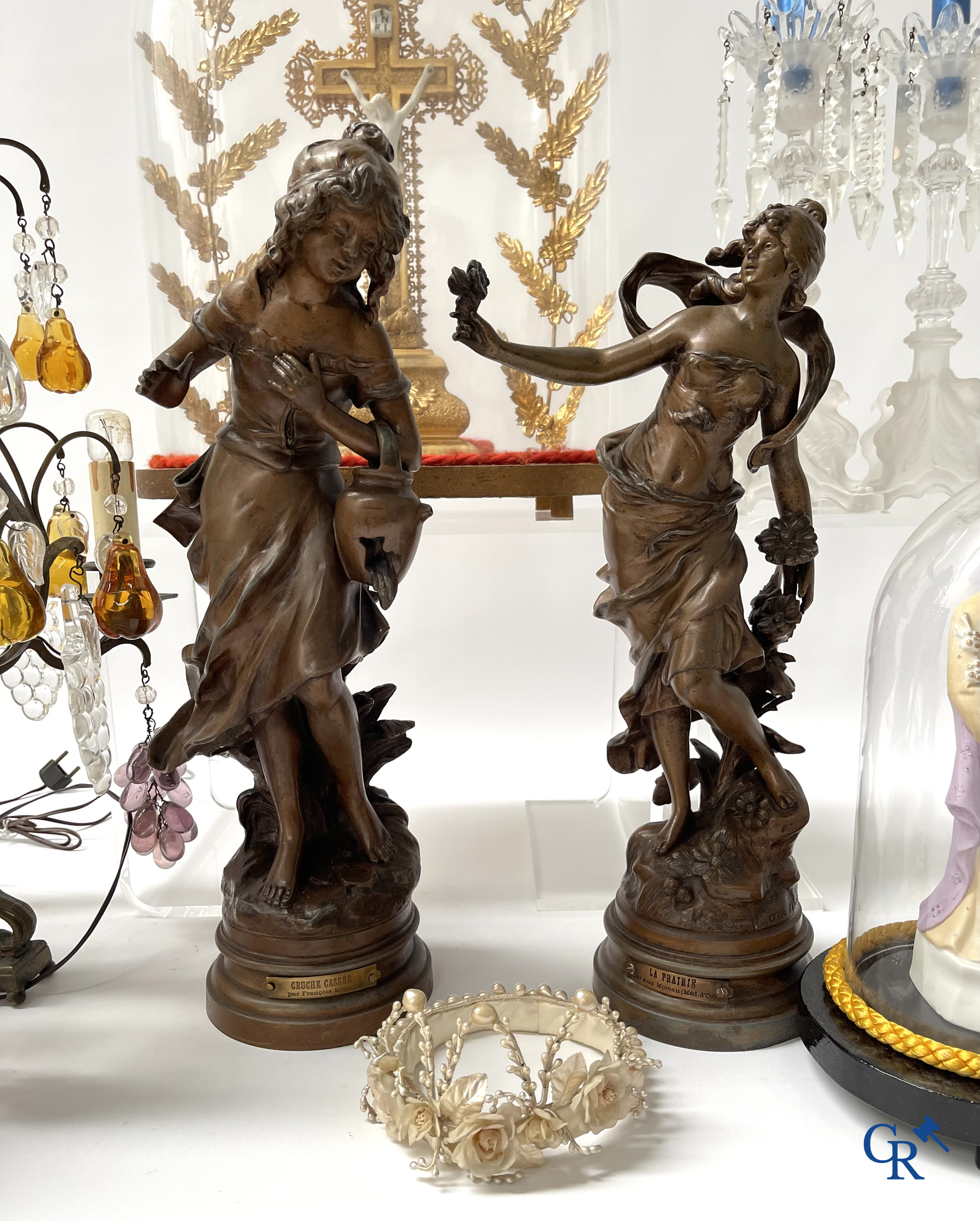 A large lot of brocante including Royal Dux, Biscuit statues, porcelain, globes, spelter statues, table lamp, chandelier etc.