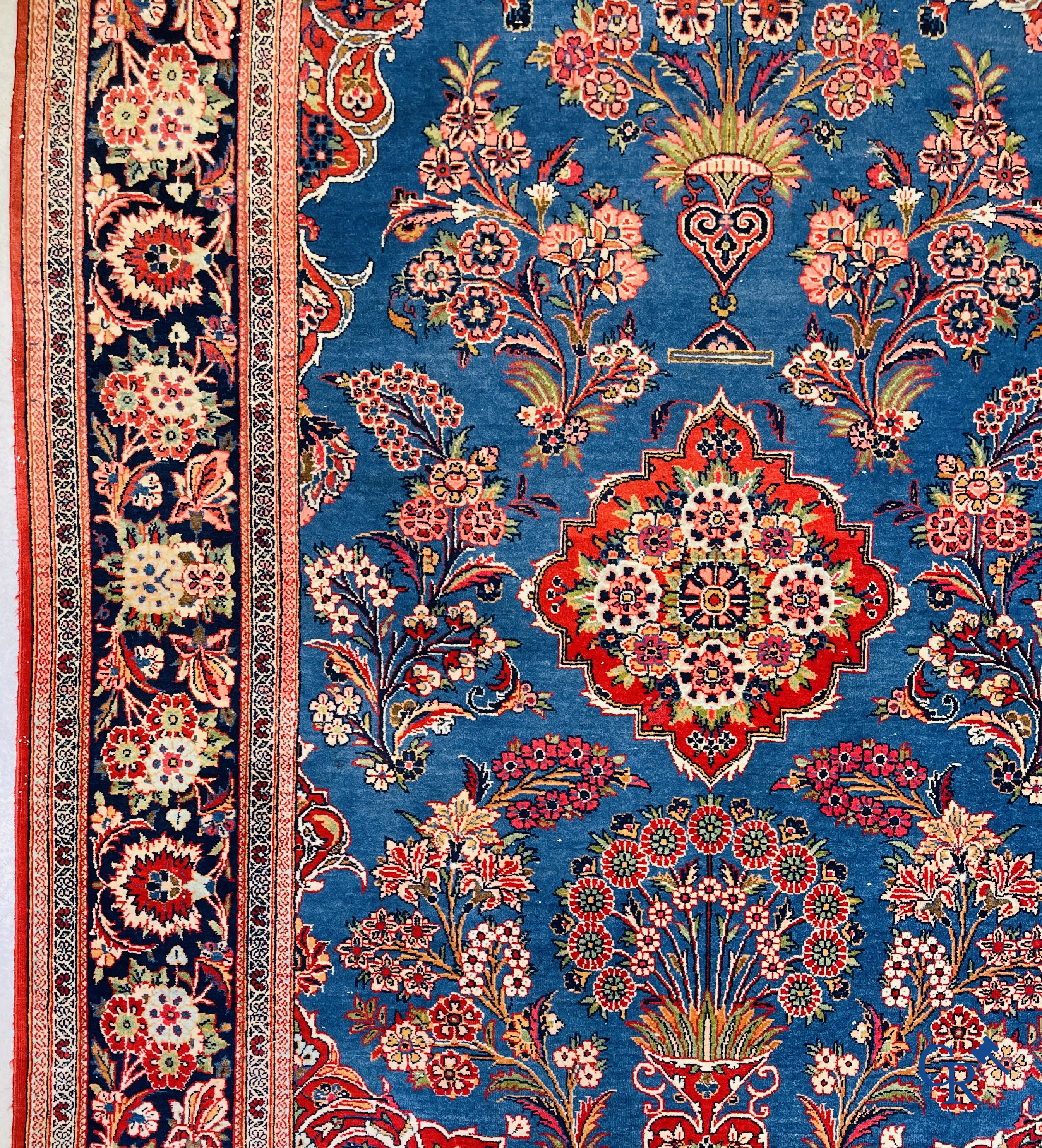 Oriental carpets: Iran, finely hand-knotted antique Persian carpet with flowers and flower vases.