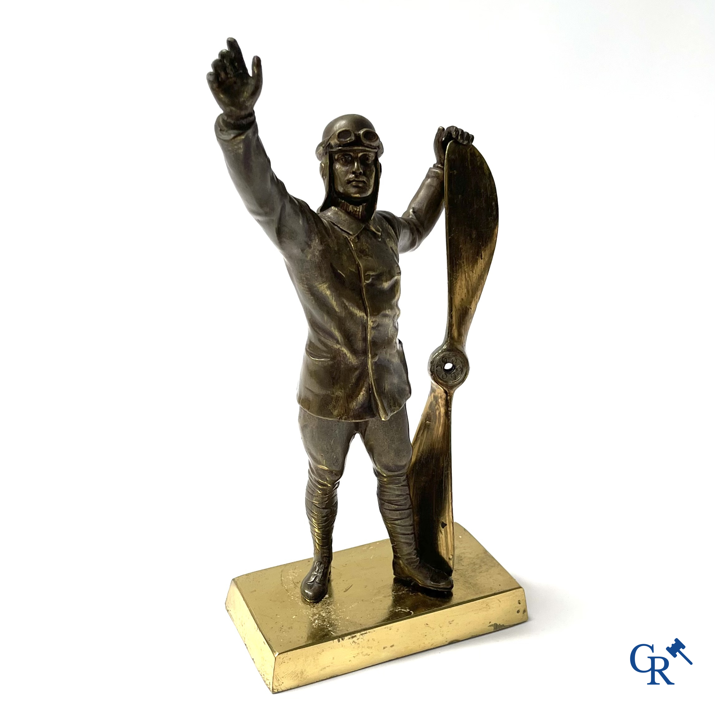 Aeronautics, a bronze representation of an aircraft pilot with propeller. Around 1930.