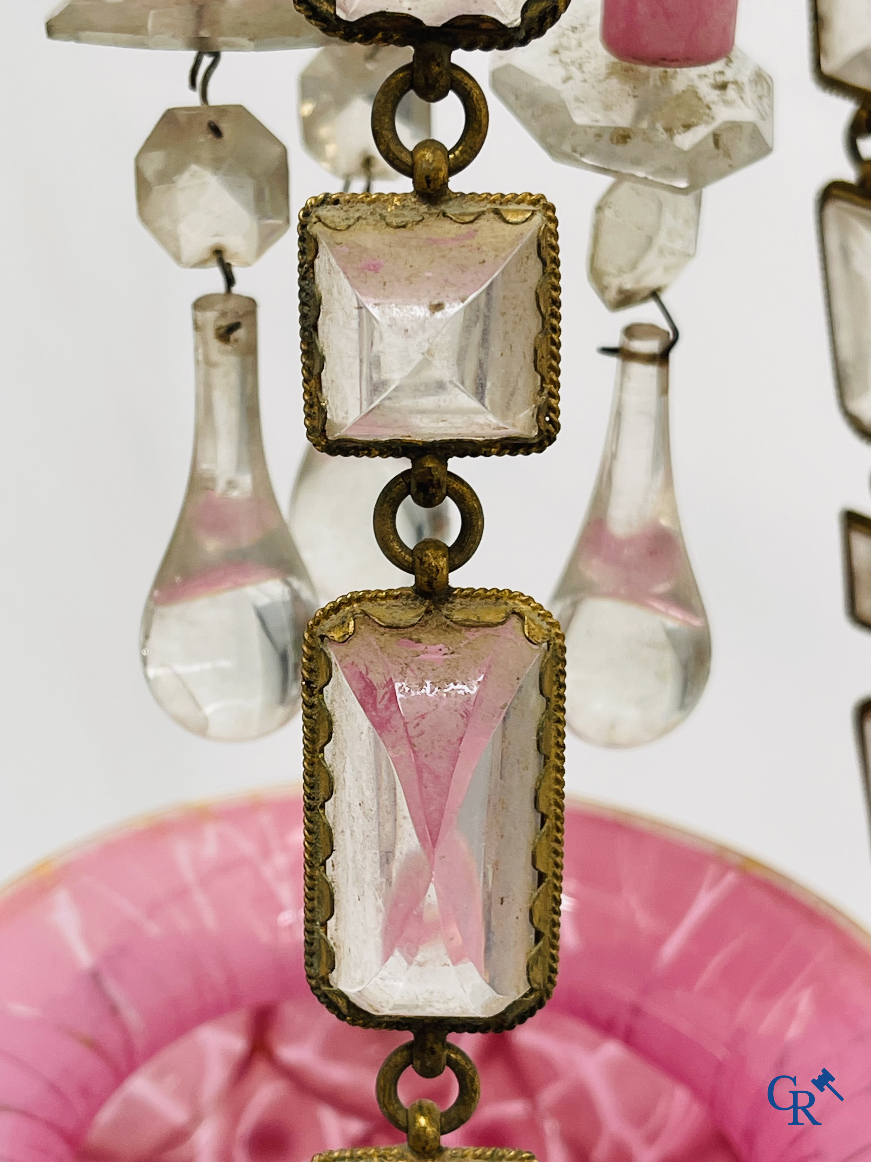 A chandelier in pink opaline and gilded frames with mounted crystal in the style of Baccarat. Circa 1860.