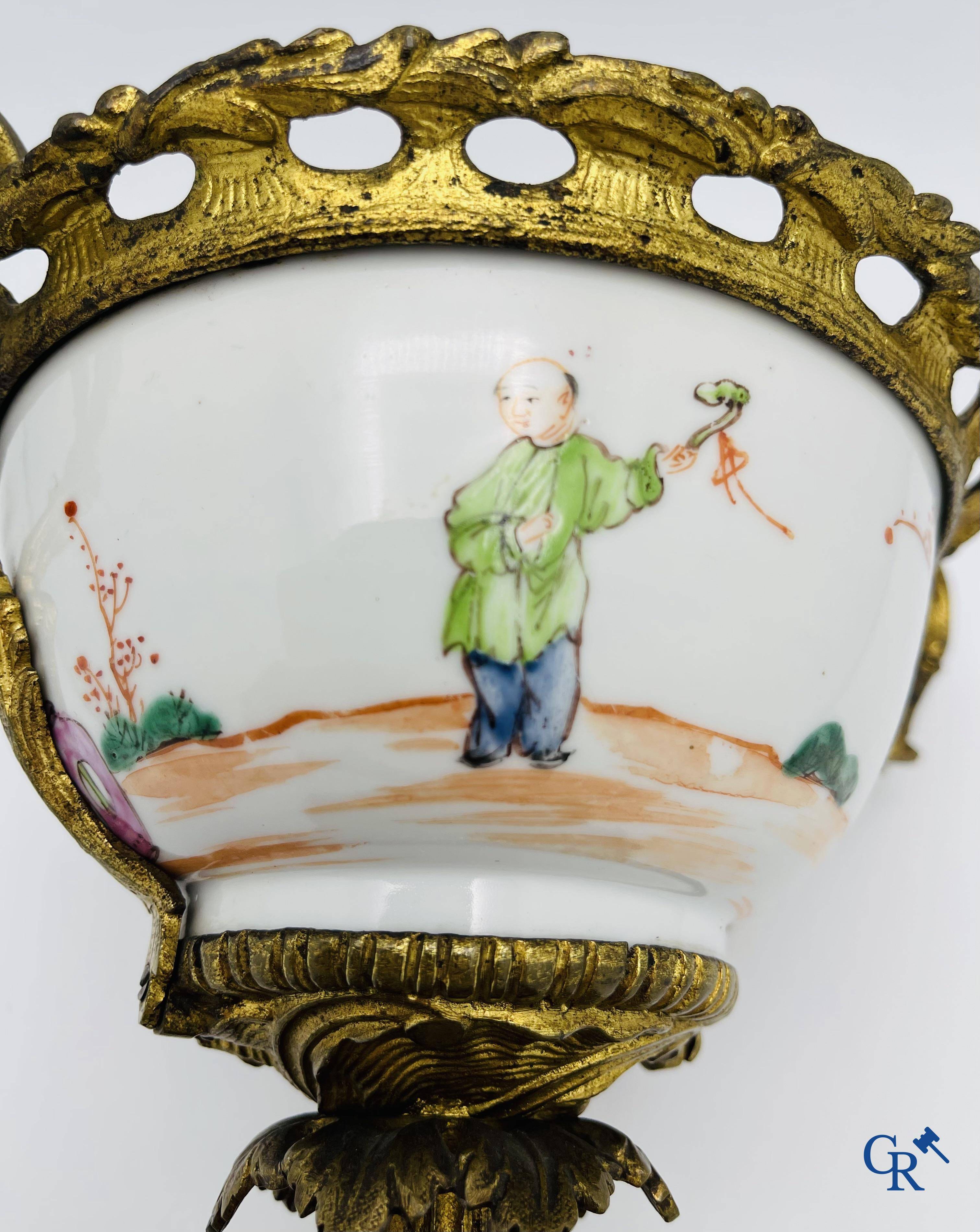 Chinese porcelain: An 18th century gilt-bronze mounted bowl in Chinese export porcelain.