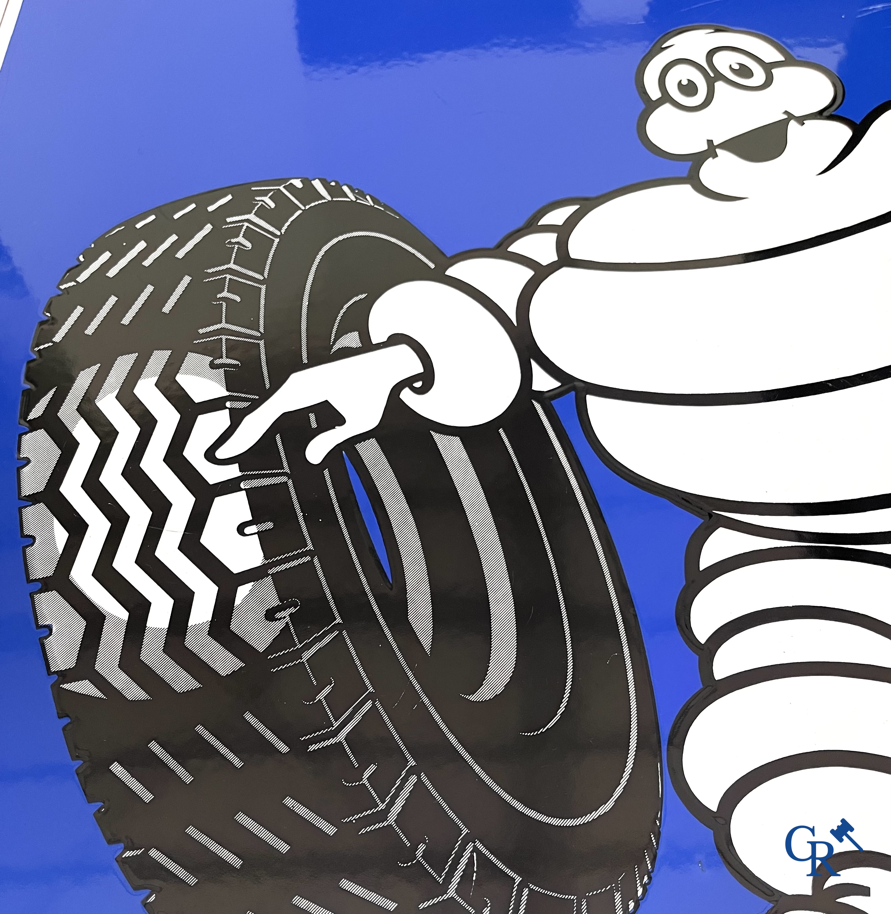 Michelin, Large enamel advertising sign of the running Bibendum with tire. Emaillerie Alsacienne Strasbourg.