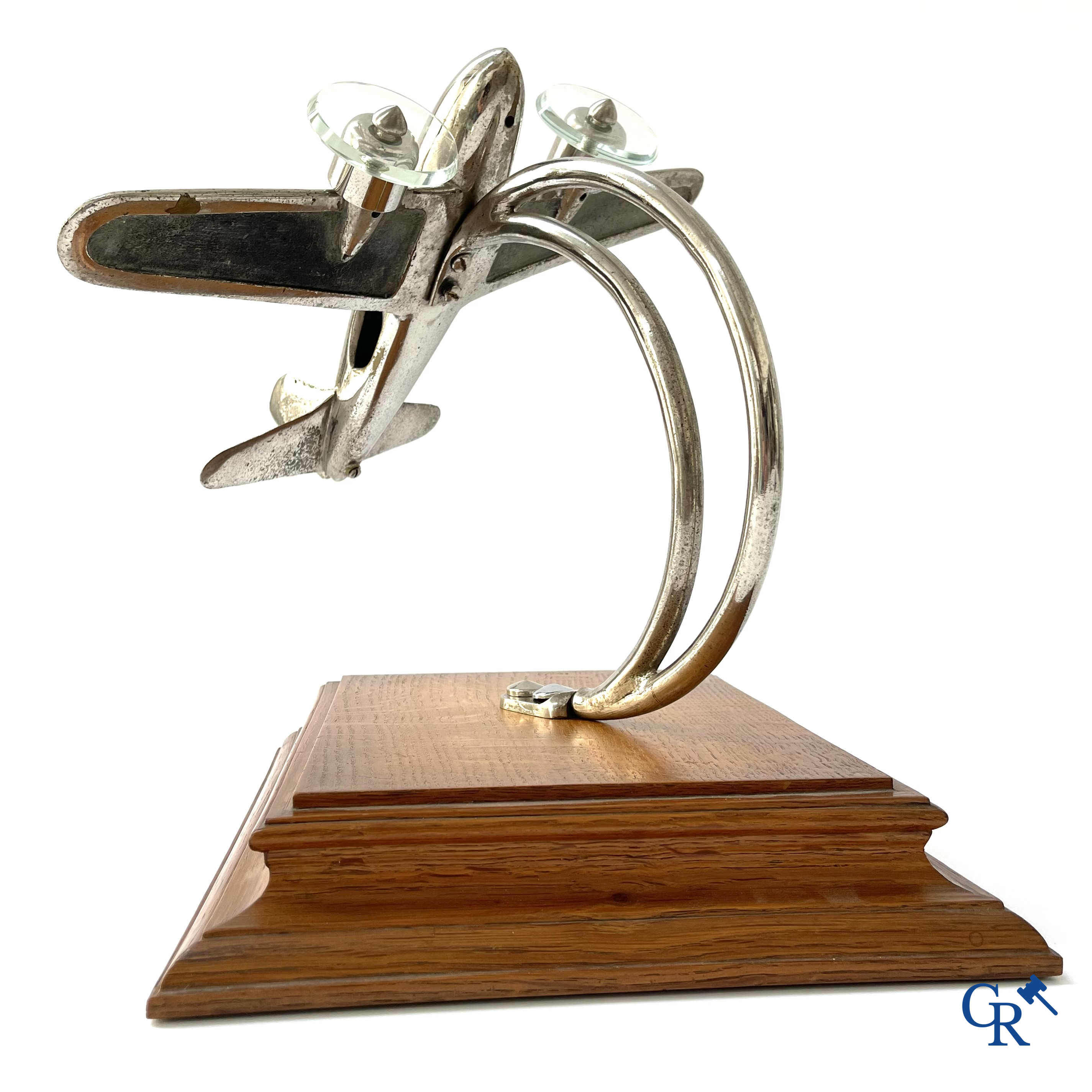 Art Deco, a large model of an aircraft taking off in chrome-plated bronze and glass propellers. 1930's.