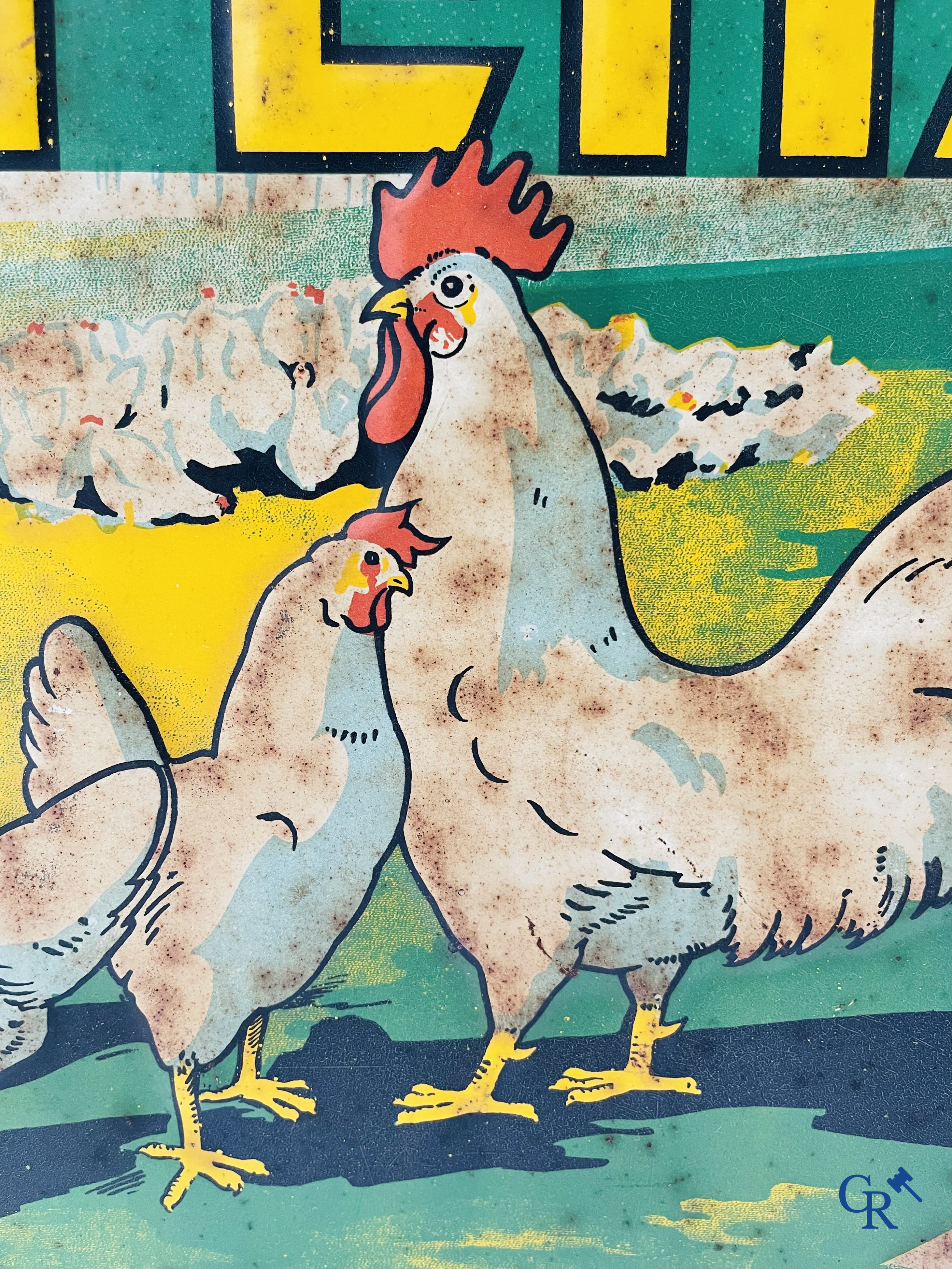 Voeders Hostens. Reclamebord in beschilderd blik voor kippenvoer van voederbedrijf Hostens te Roeselare. 1935.