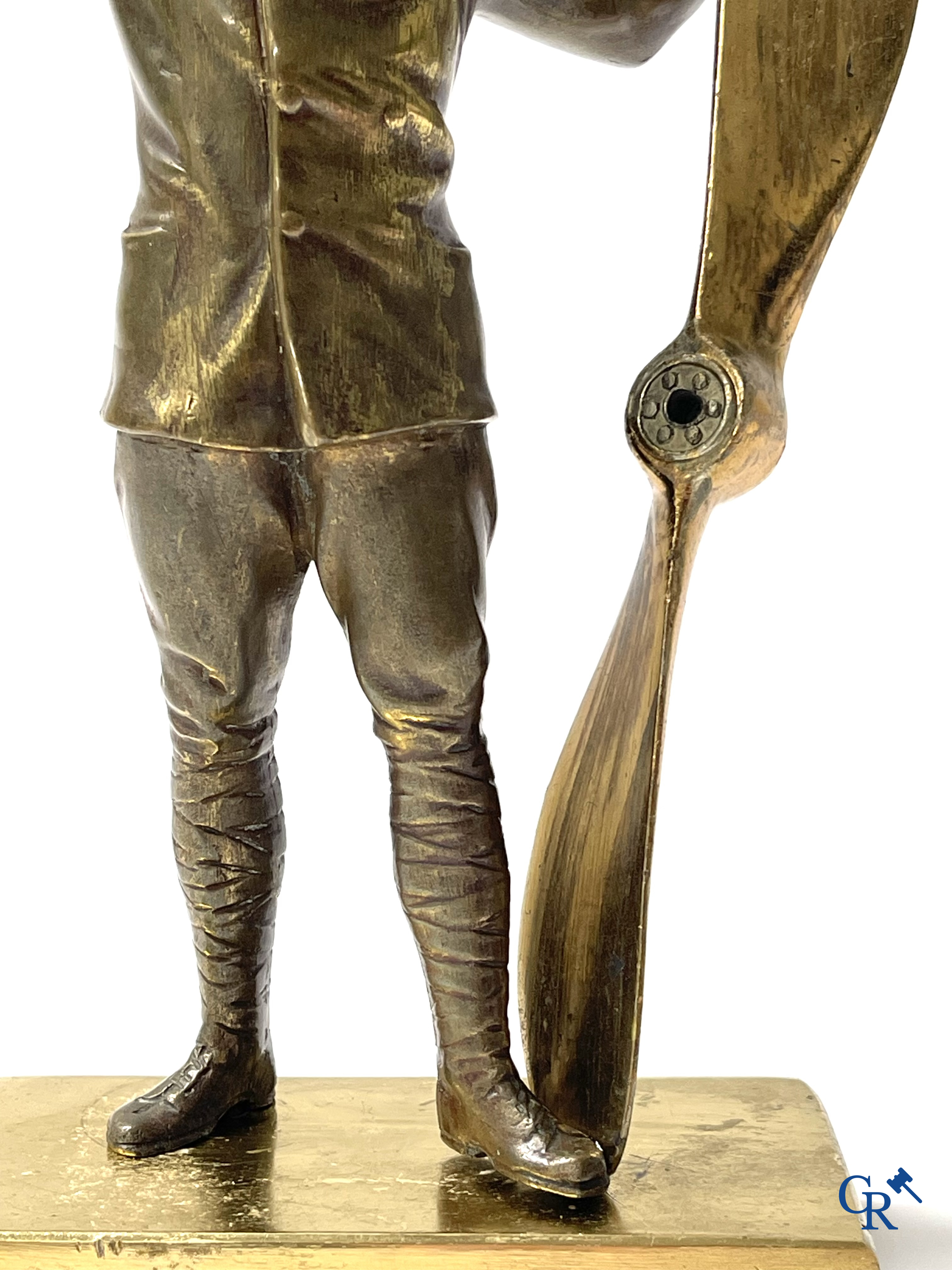 Aeronautics, a bronze representation of an aircraft pilot with propeller. Around 1930.
