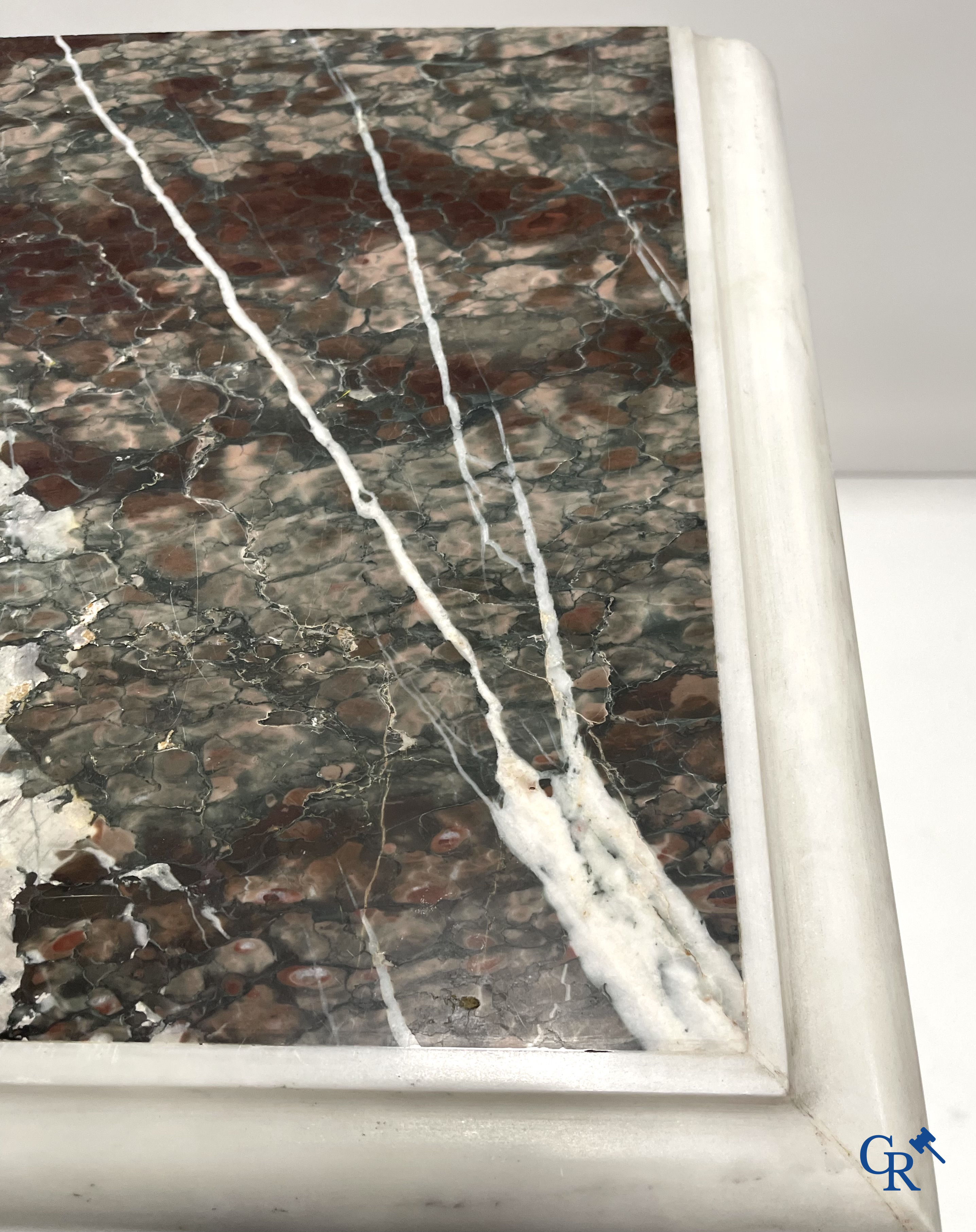 An imposing wall console in multiple types of marble. 19th century.