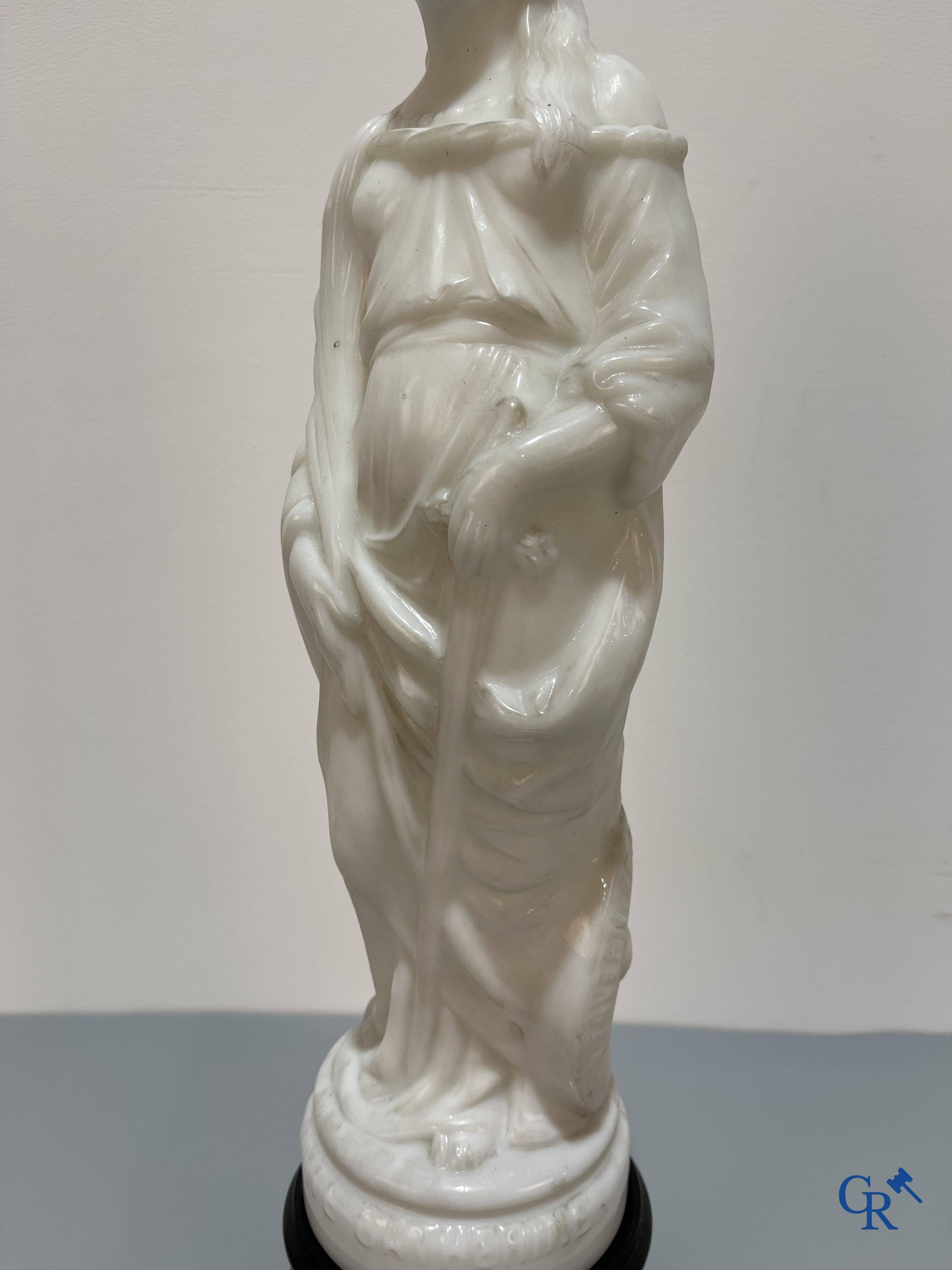 An opaline representation of Saint Catherine on a pedestal. Publicity for Bonbons John Tavernier. Circa 1900.