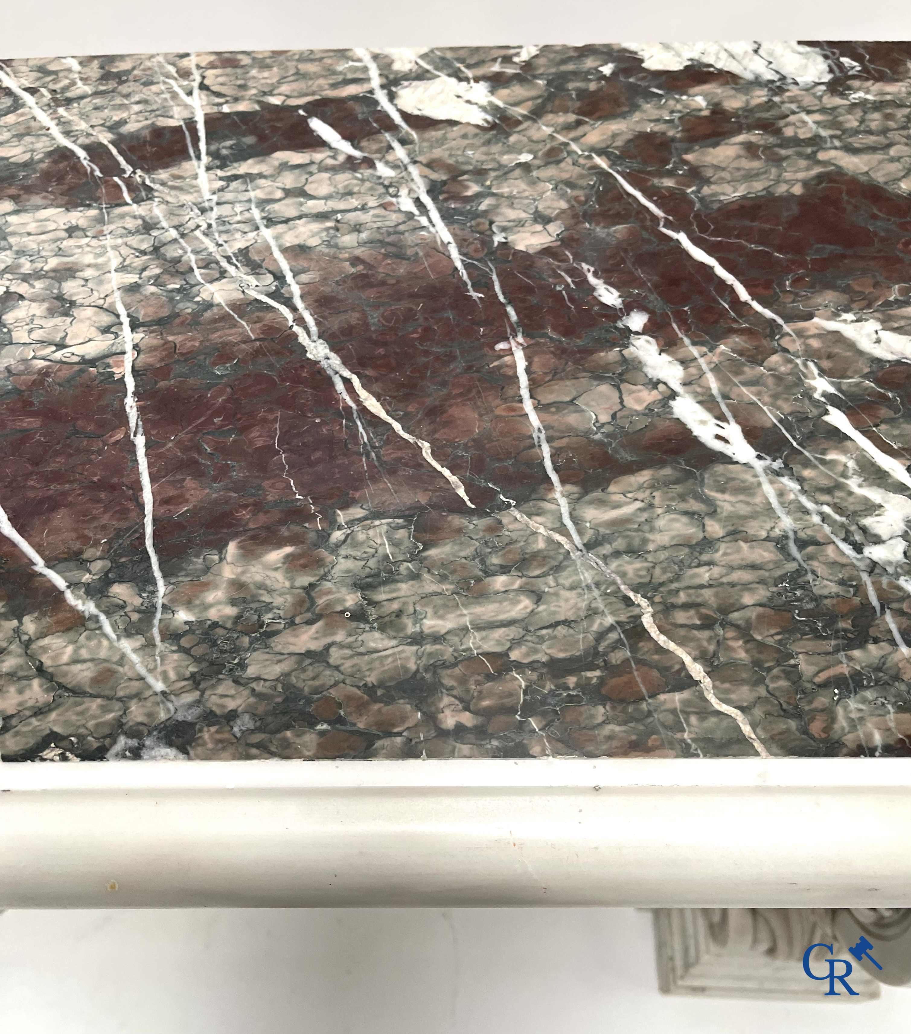 An imposing wall console in multiple types of marble. 19th century.