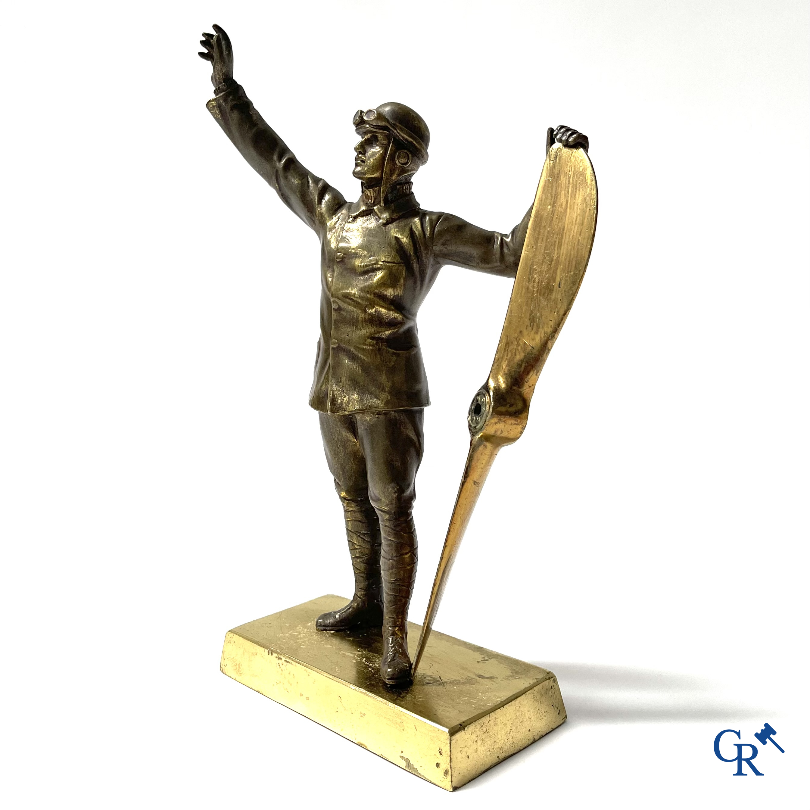 Aeronautics, a bronze representation of an aircraft pilot with propeller. Around 1930.