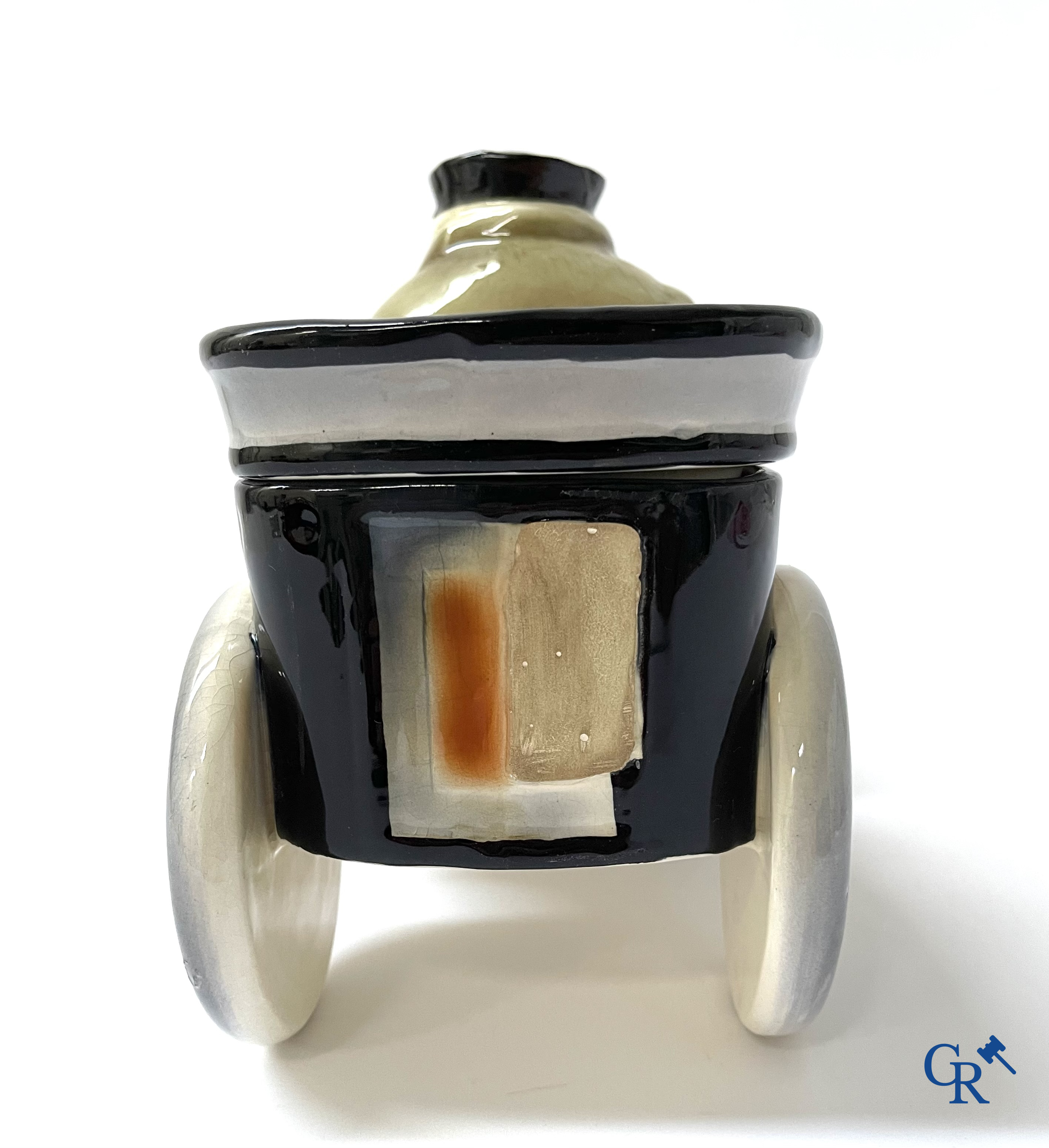 Faïencerie Fives Lille. L'Automobiliste, a large tobacco jar in the shape of a vintage car with a driver. Around 1910.