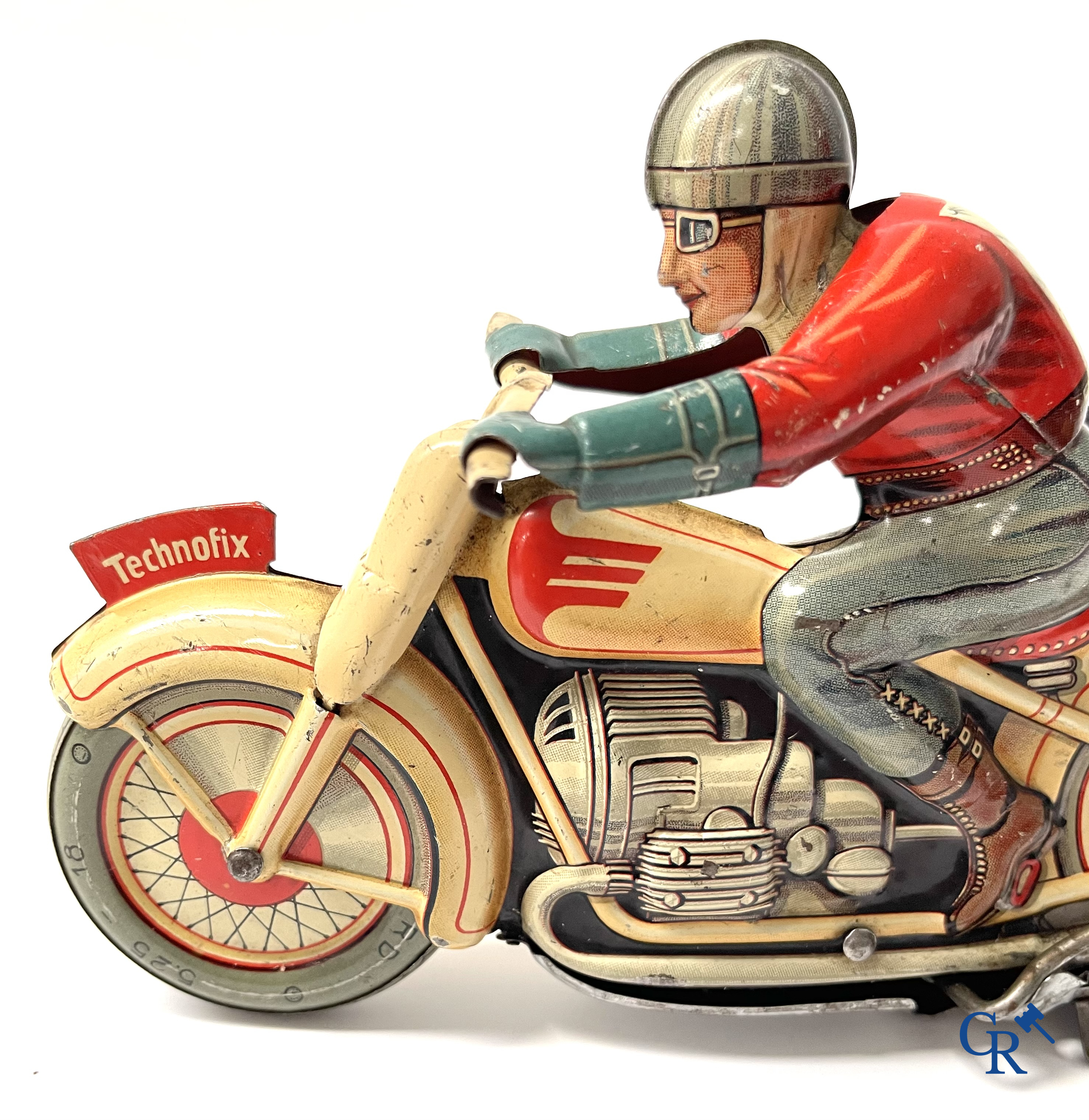 Technofix G.E. 255. Een mechanisch blikken speelgoed motorfiets. Made in U.S. - zone Germany.