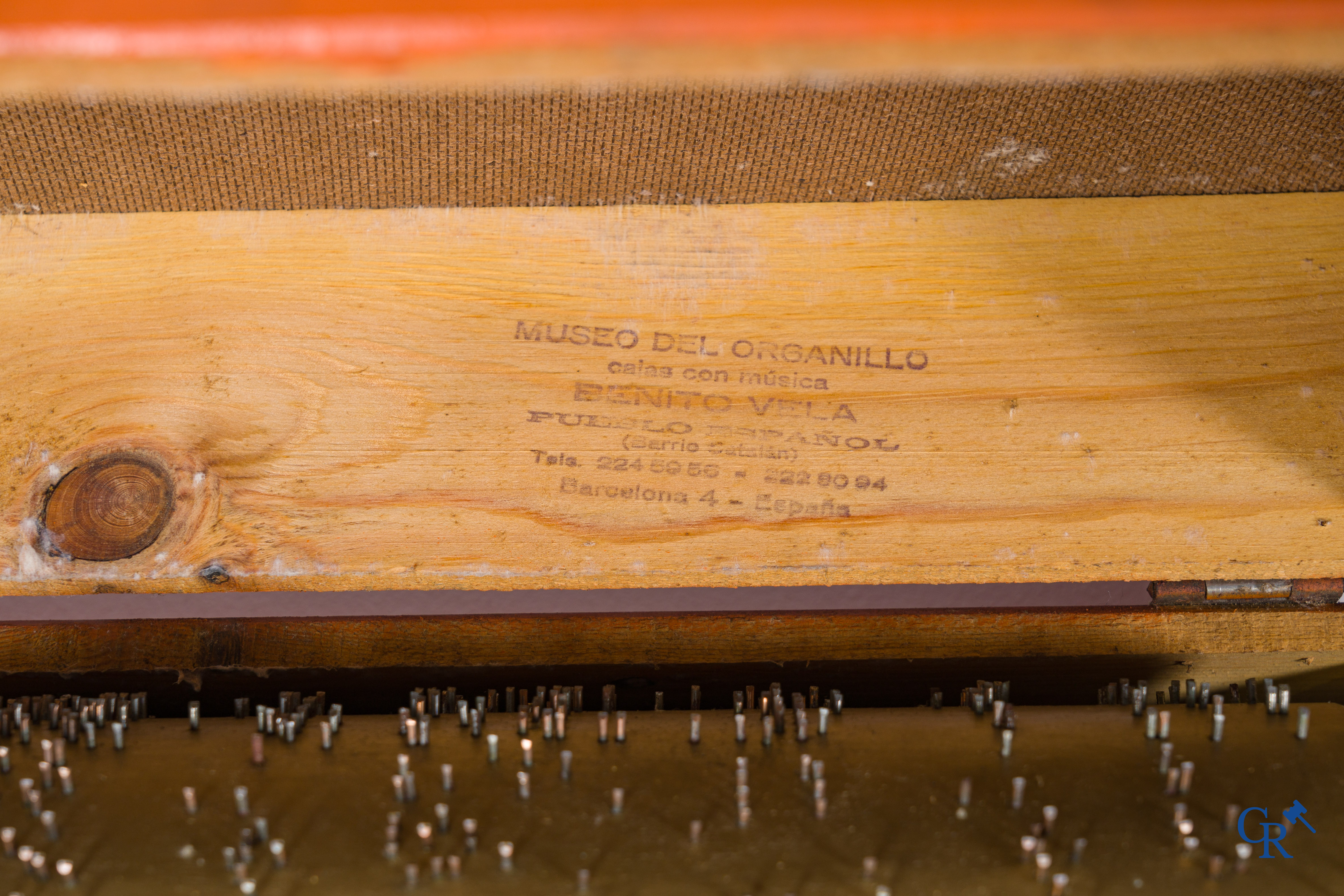 Musical instruments, a small barrel organ, Spanish made.