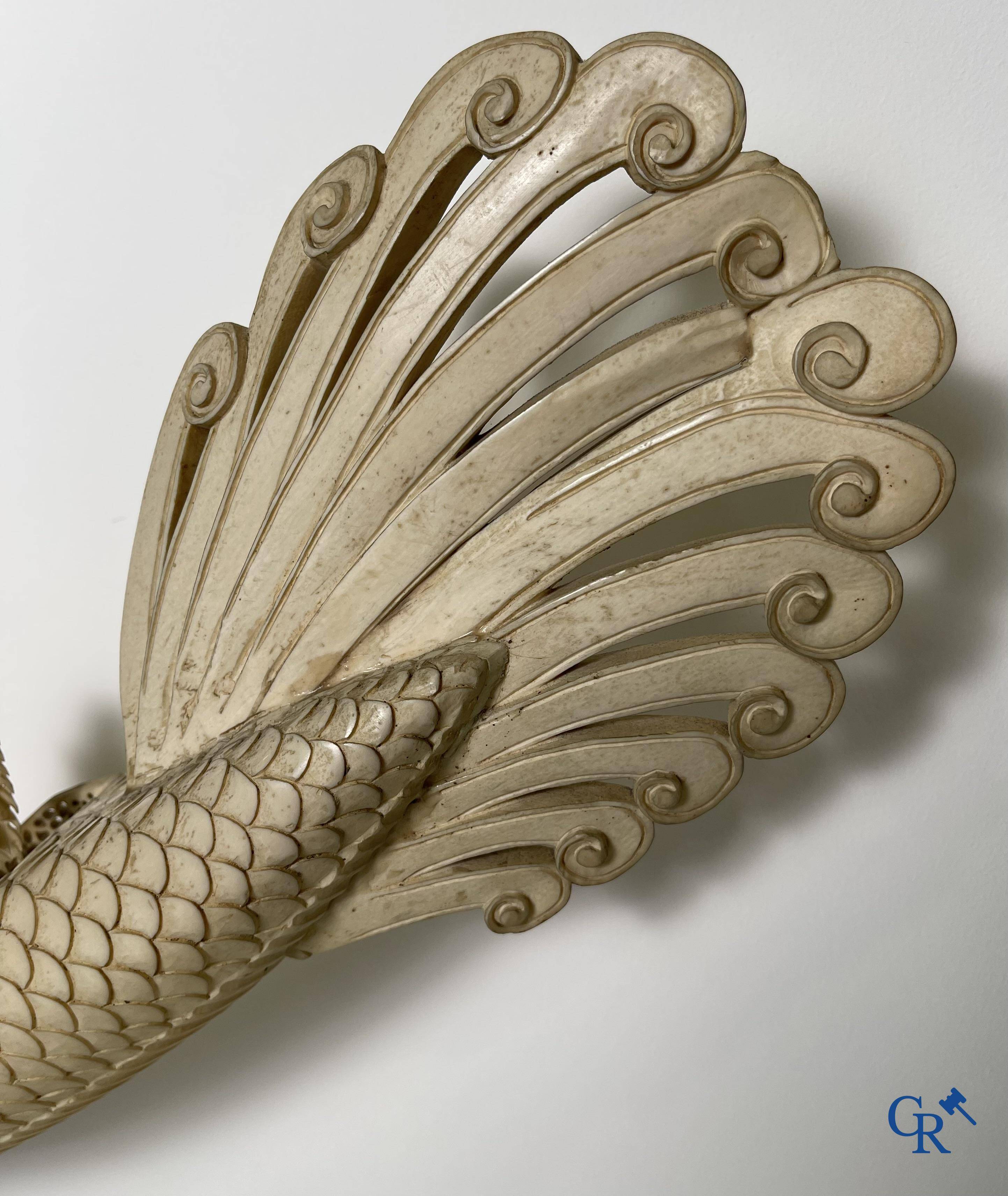 Asian Art: A large Chinese ivory dragon boat on a wooden pedestal. 19th century.