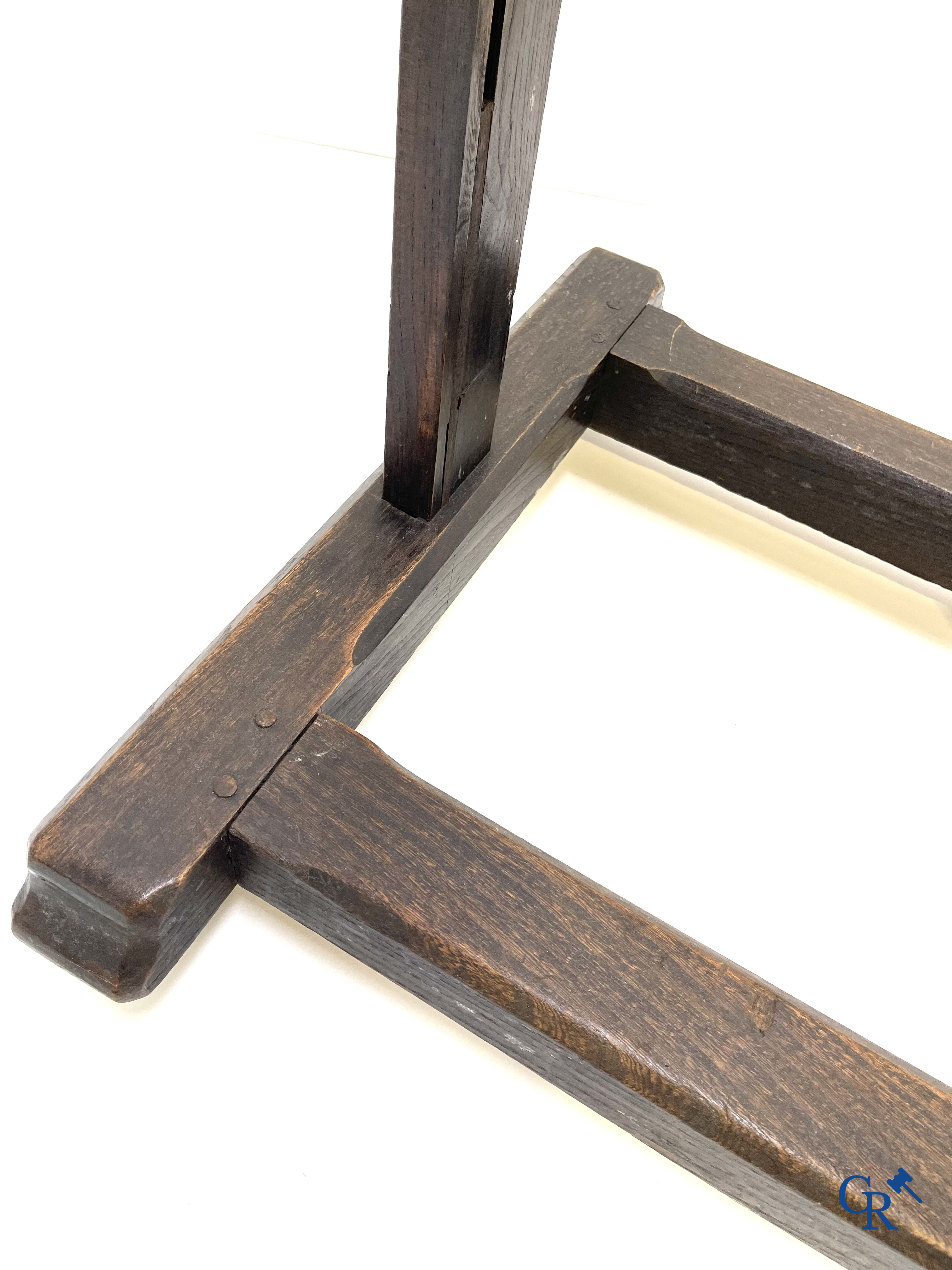 A large antique painter's studio easel with crank adjustment system. 19th century.